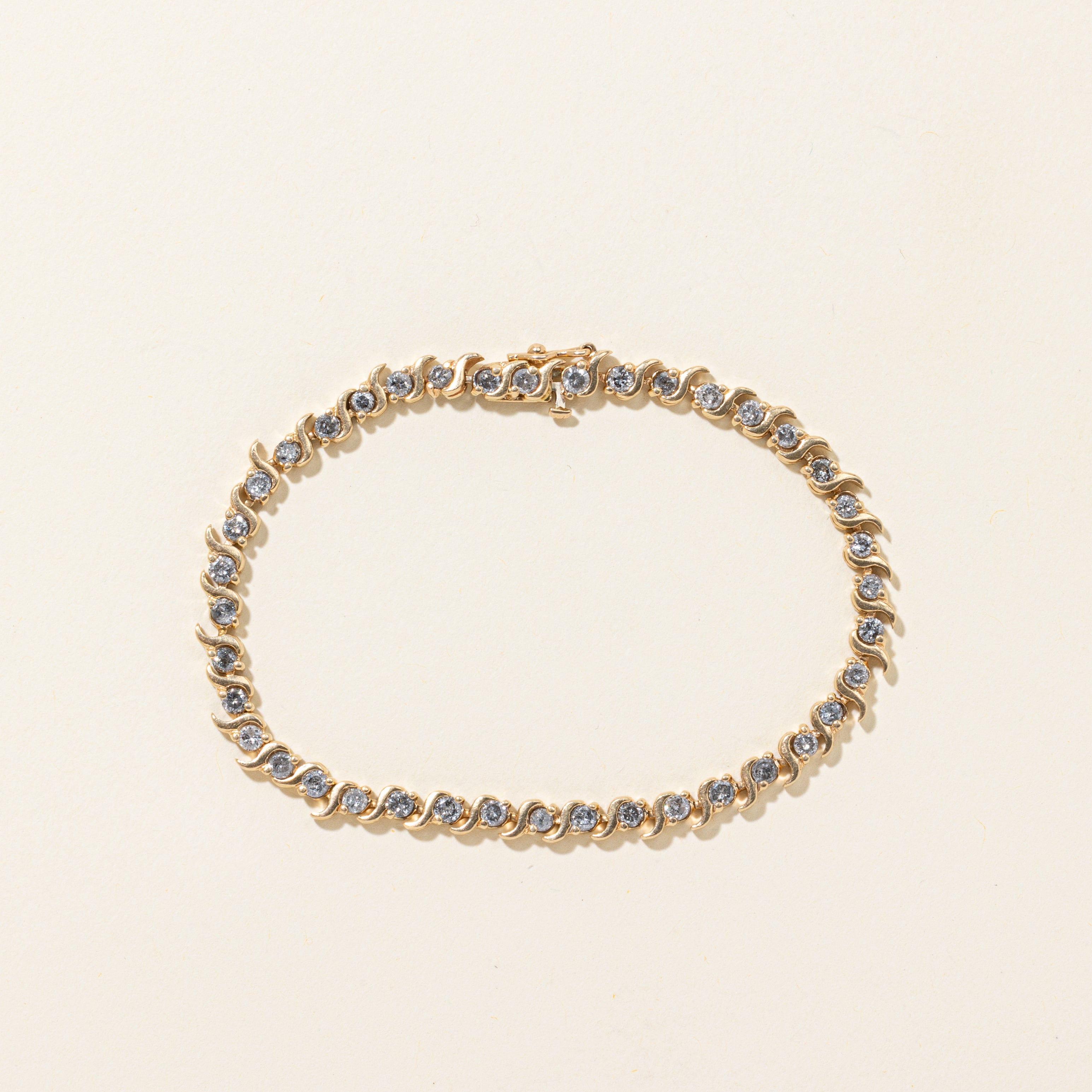 Yellow Gold Diamond Swirl Tennis Bracelet | 2.60ctw | 7"