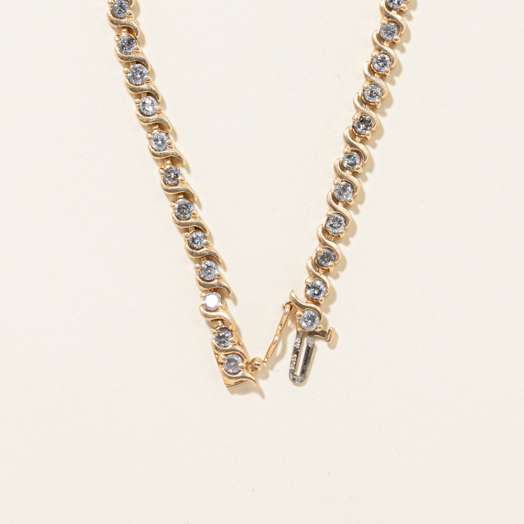 Yellow Gold Diamond Swirl Tennis Bracelet | 2.60ctw | 7"