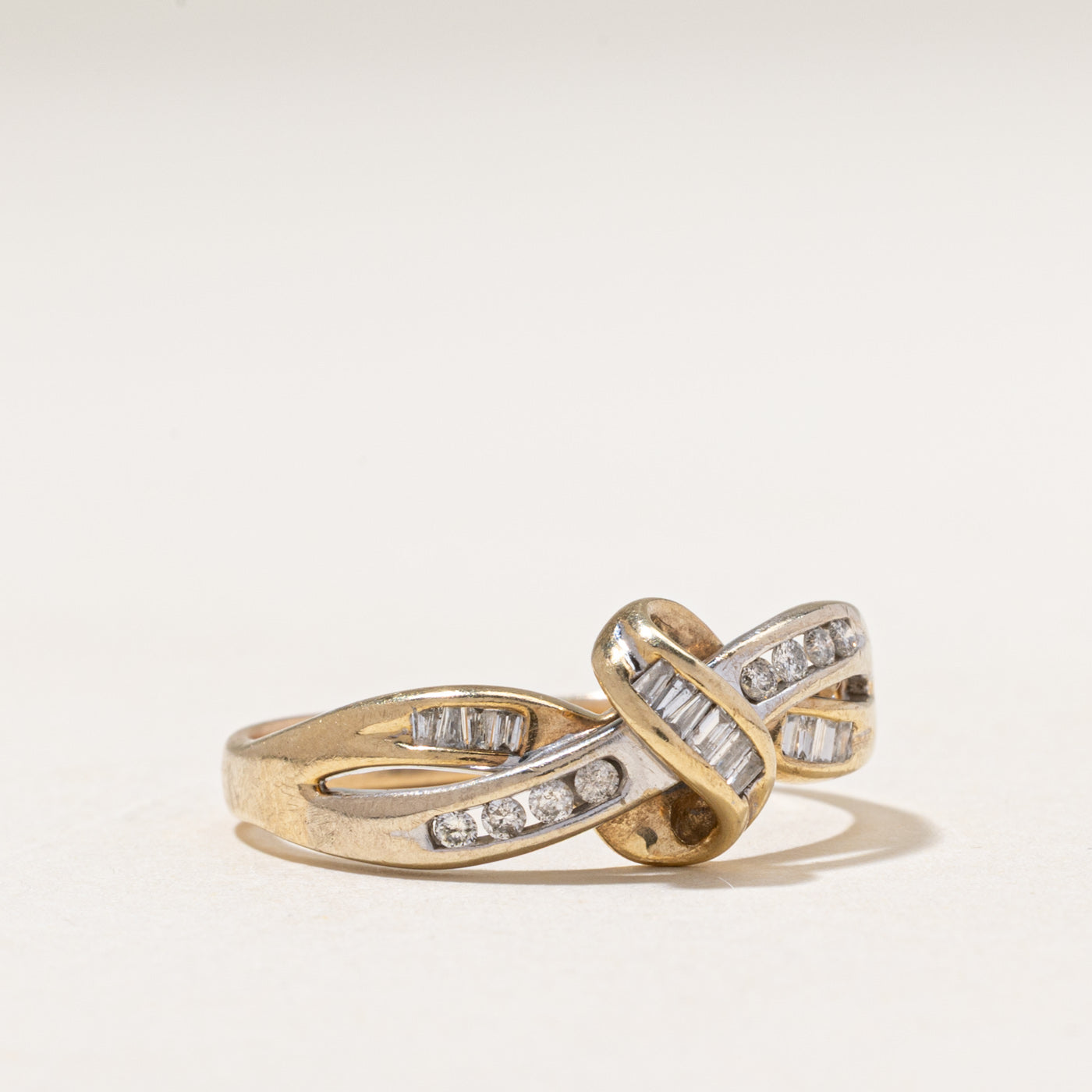 Baguette Cut Diamond Cross Over Knot Ring | 0.22ctw | SZ 10.25