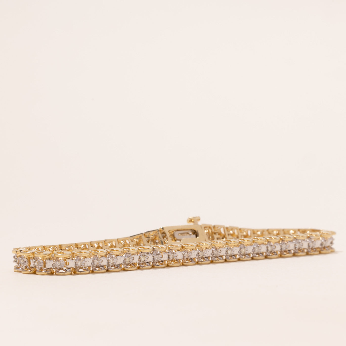 Yellow Gold Illusion Set Diamond Tennis Bracelet | 0.40ctw | 7.5"