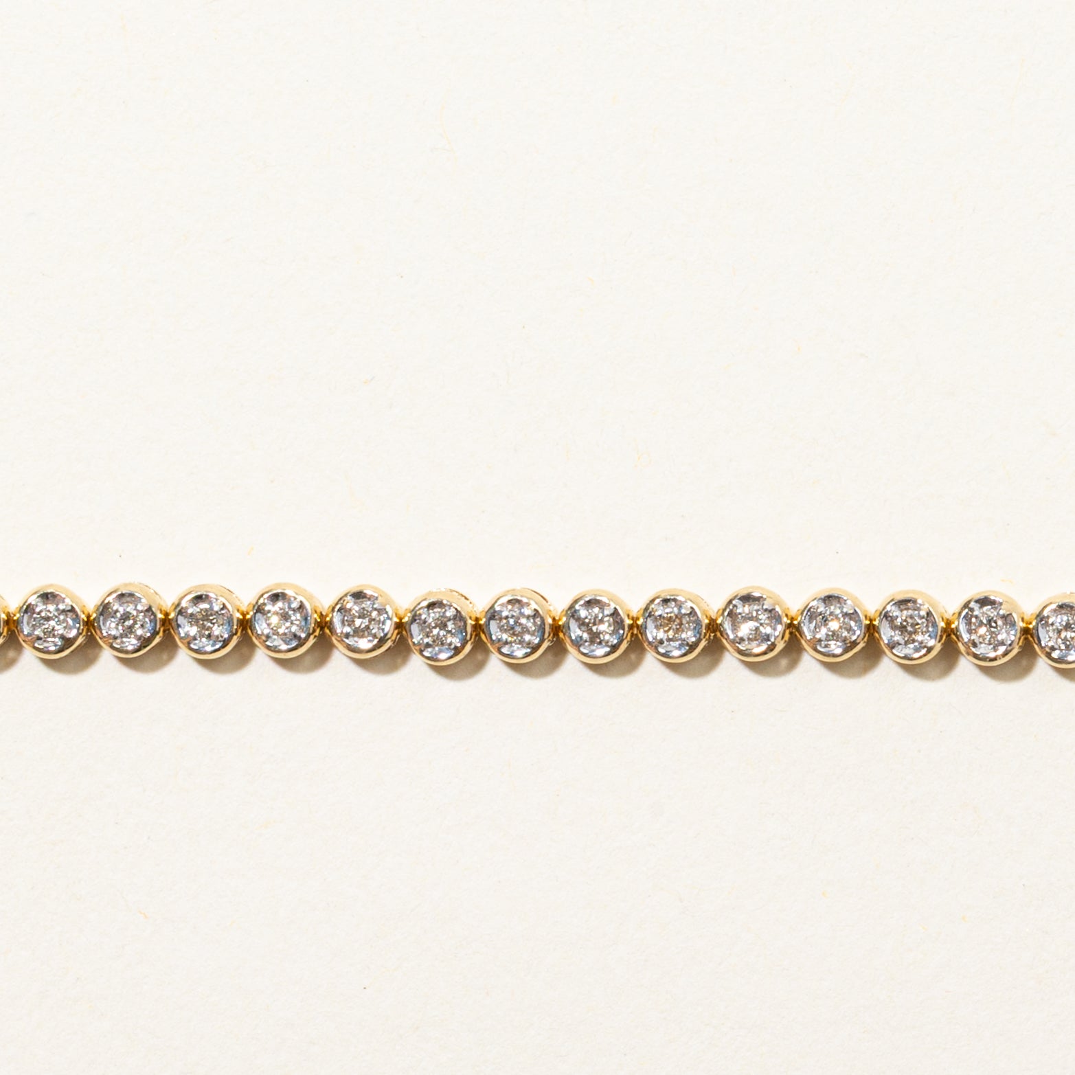 Yellow Gold Illusion Set Diamond Tennis Bracelet | 0.90ctw | 7.5"