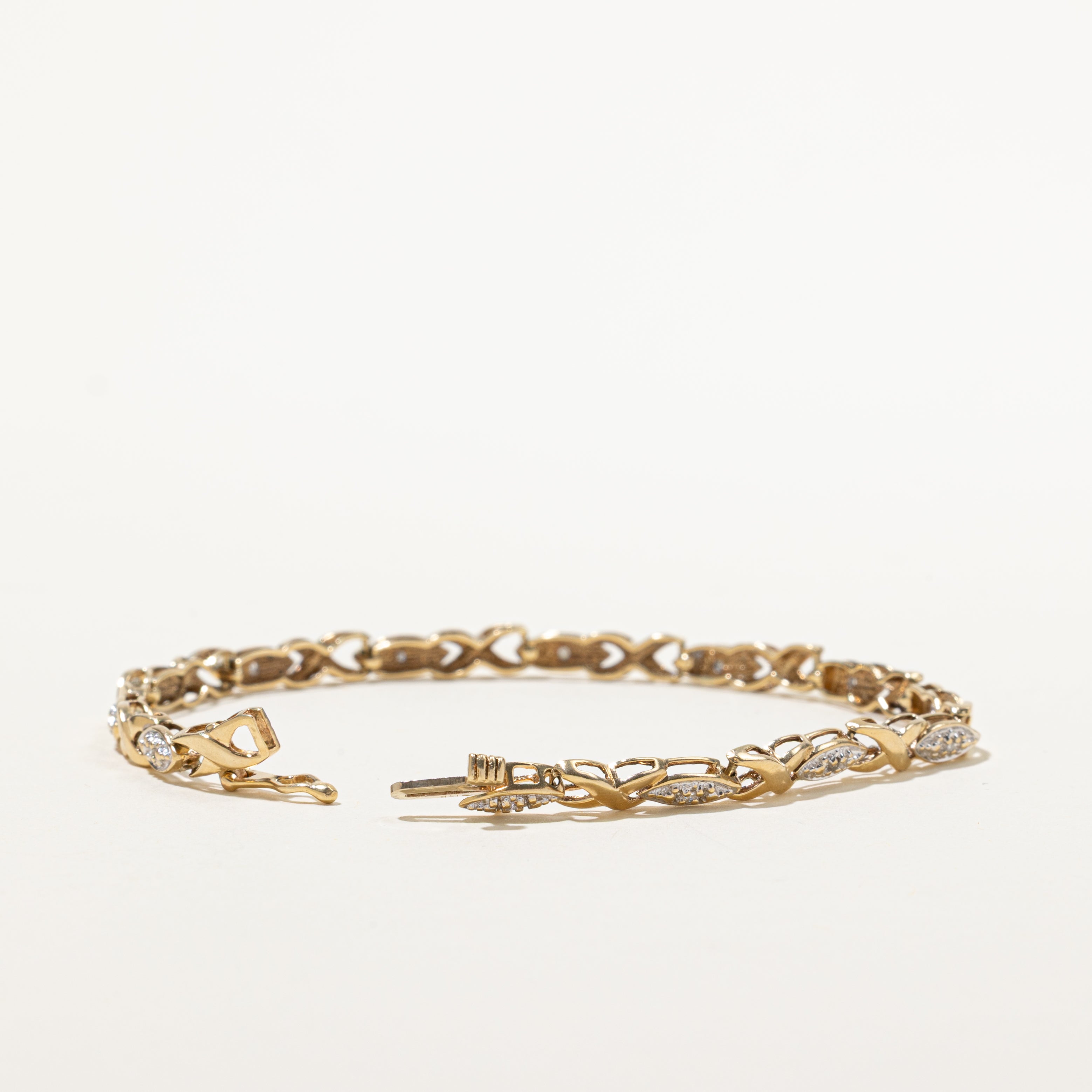 Yellow Gold Diamond X Chain Tennis Bracelet | 0.11ctw | 7.5"