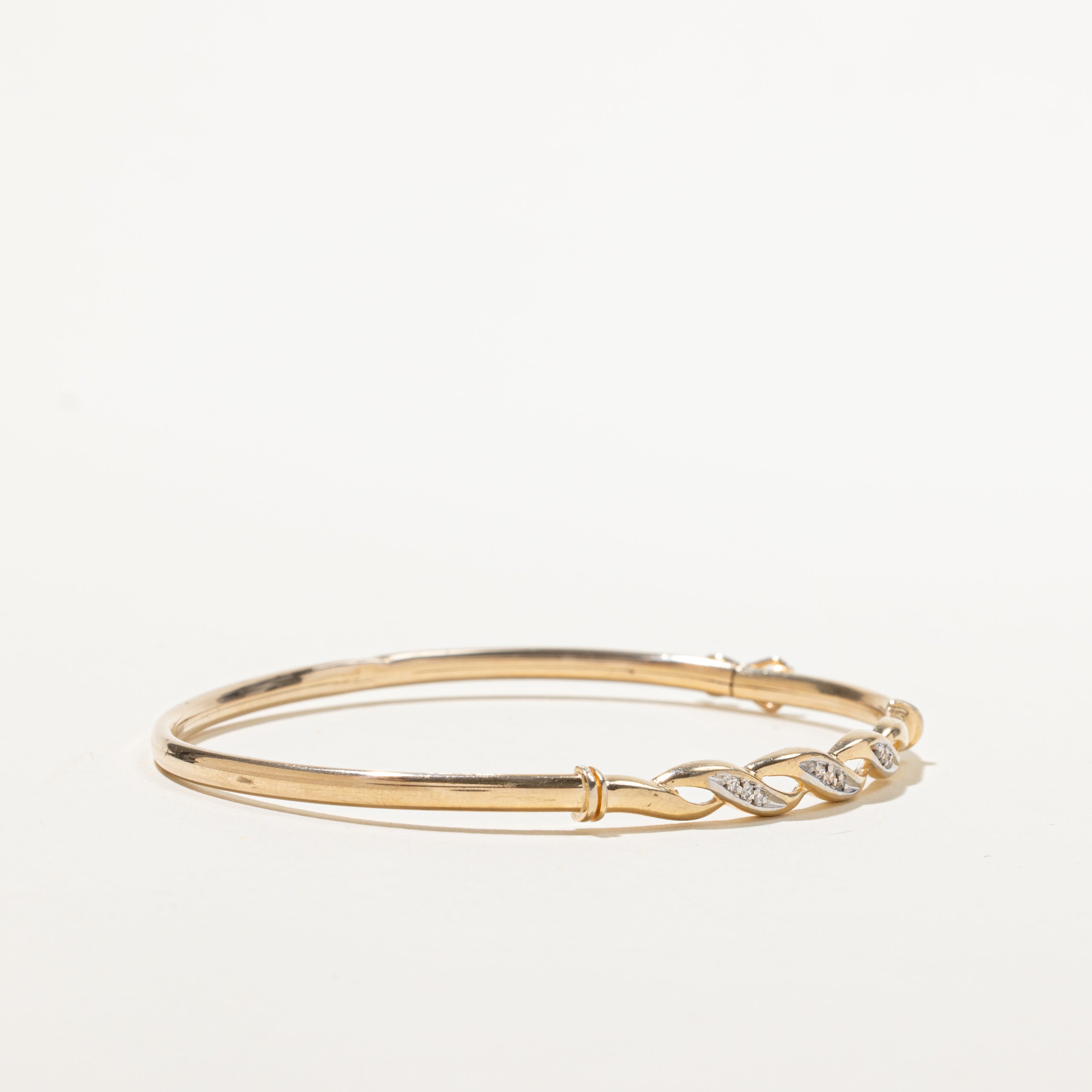 Yellow Gold Diamond Twisted Bangle | 0.08ctw | 7"