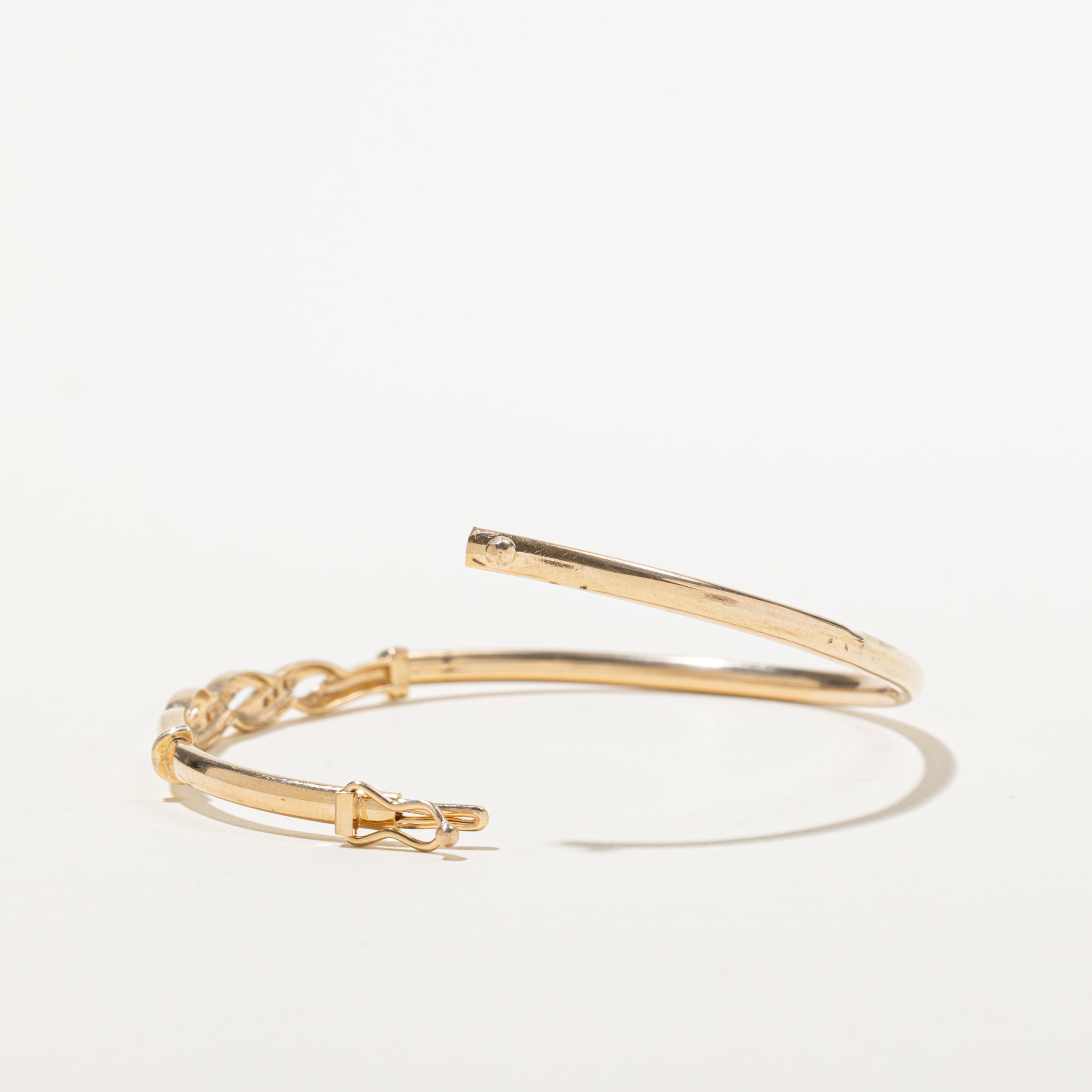 Yellow Gold Diamond Twisted Bangle | 0.08ctw | 7"