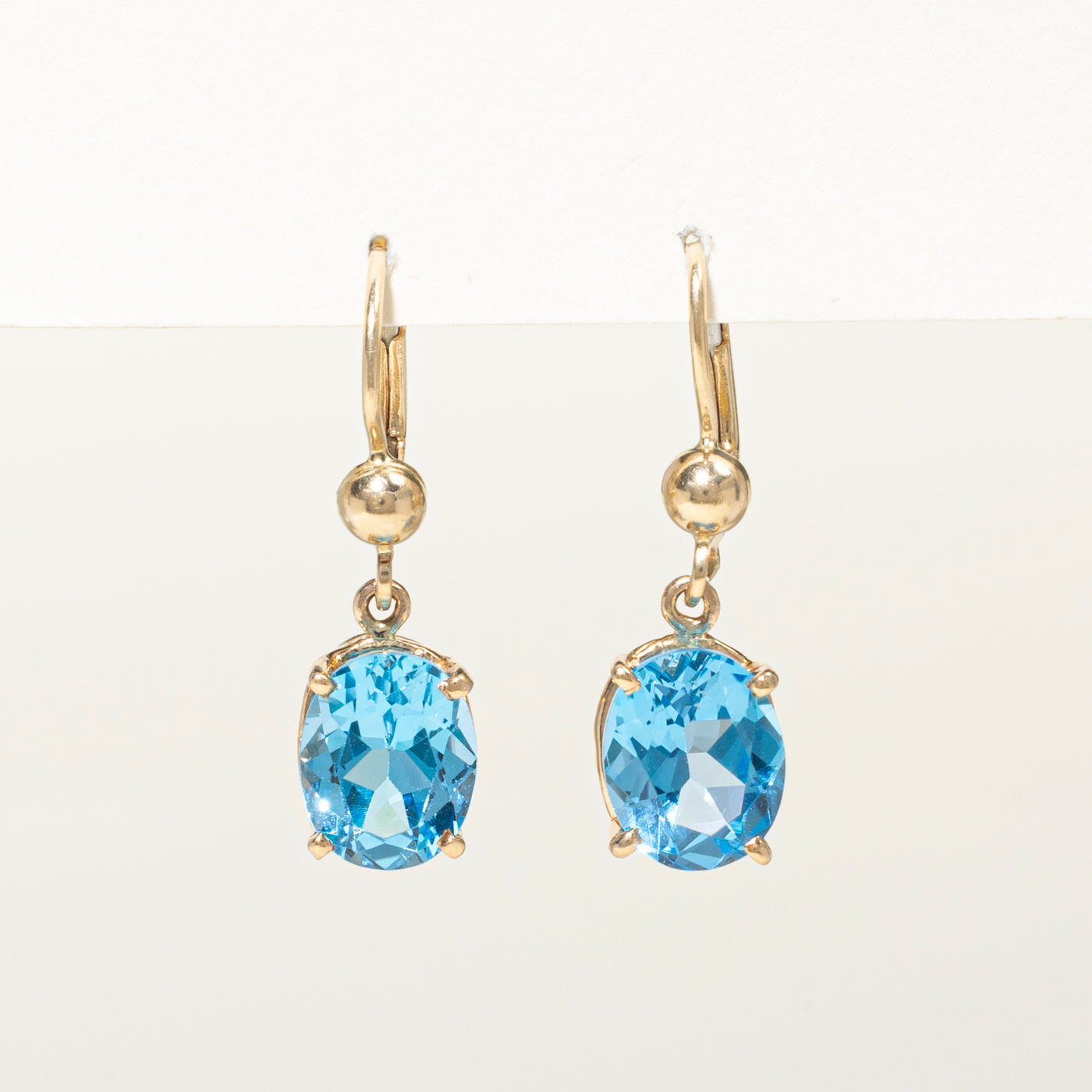 Oval Cut Blue Topaz Drop Earrings | 7.60ctw