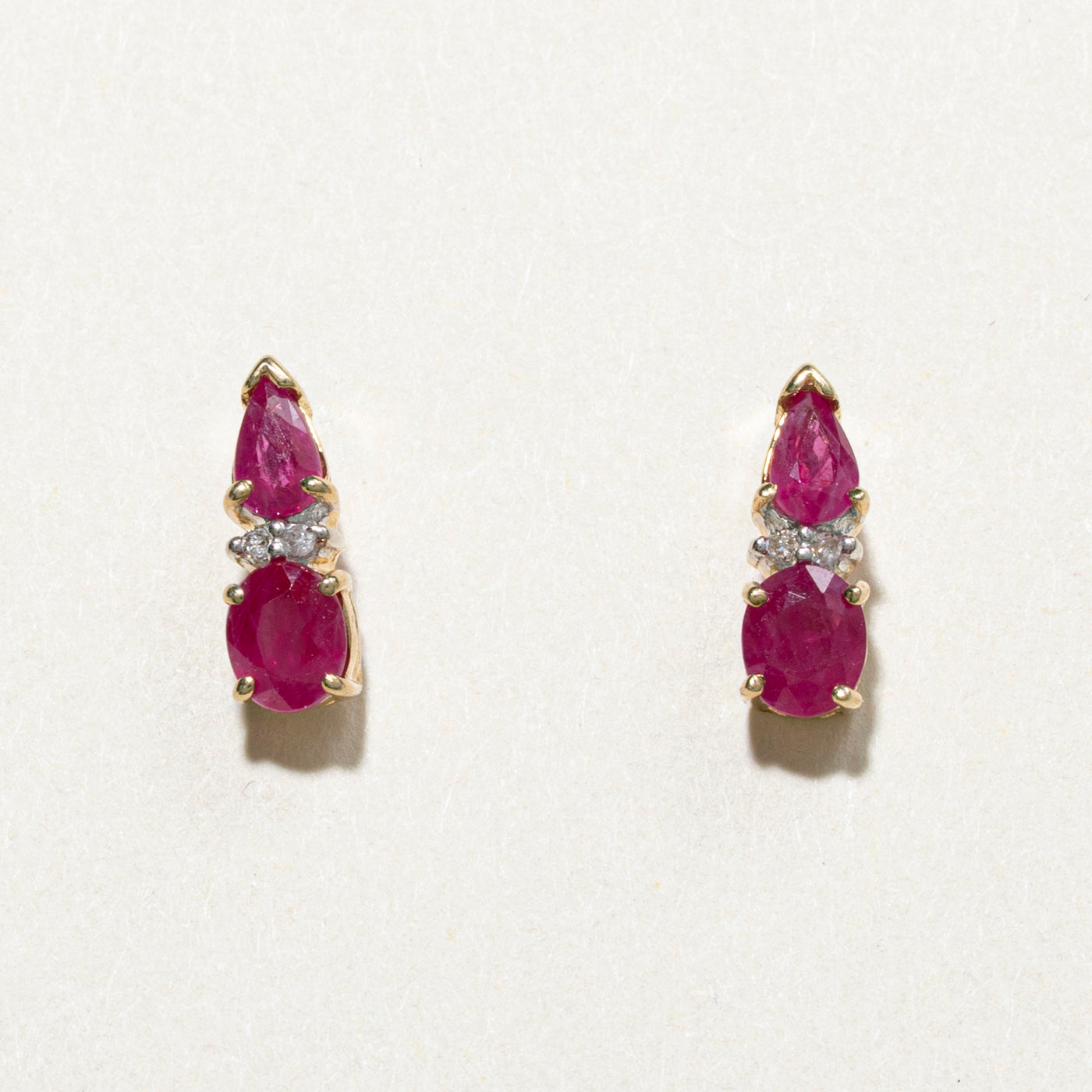 Oval Cut Ruby & Diamond Stud Earrings | 1.40ctw, 0.02ct
