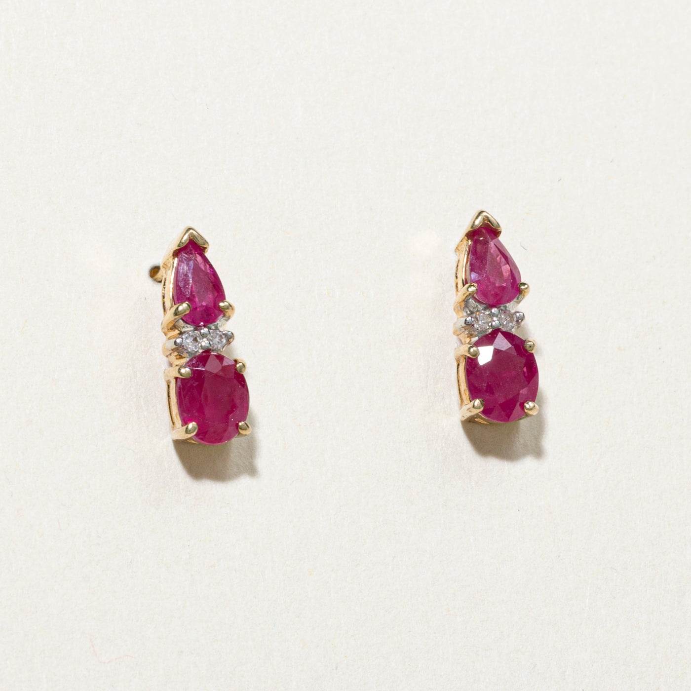 Oval Cut Ruby & Diamond Stud Earrings | 1.40ctw, 0.02ct
