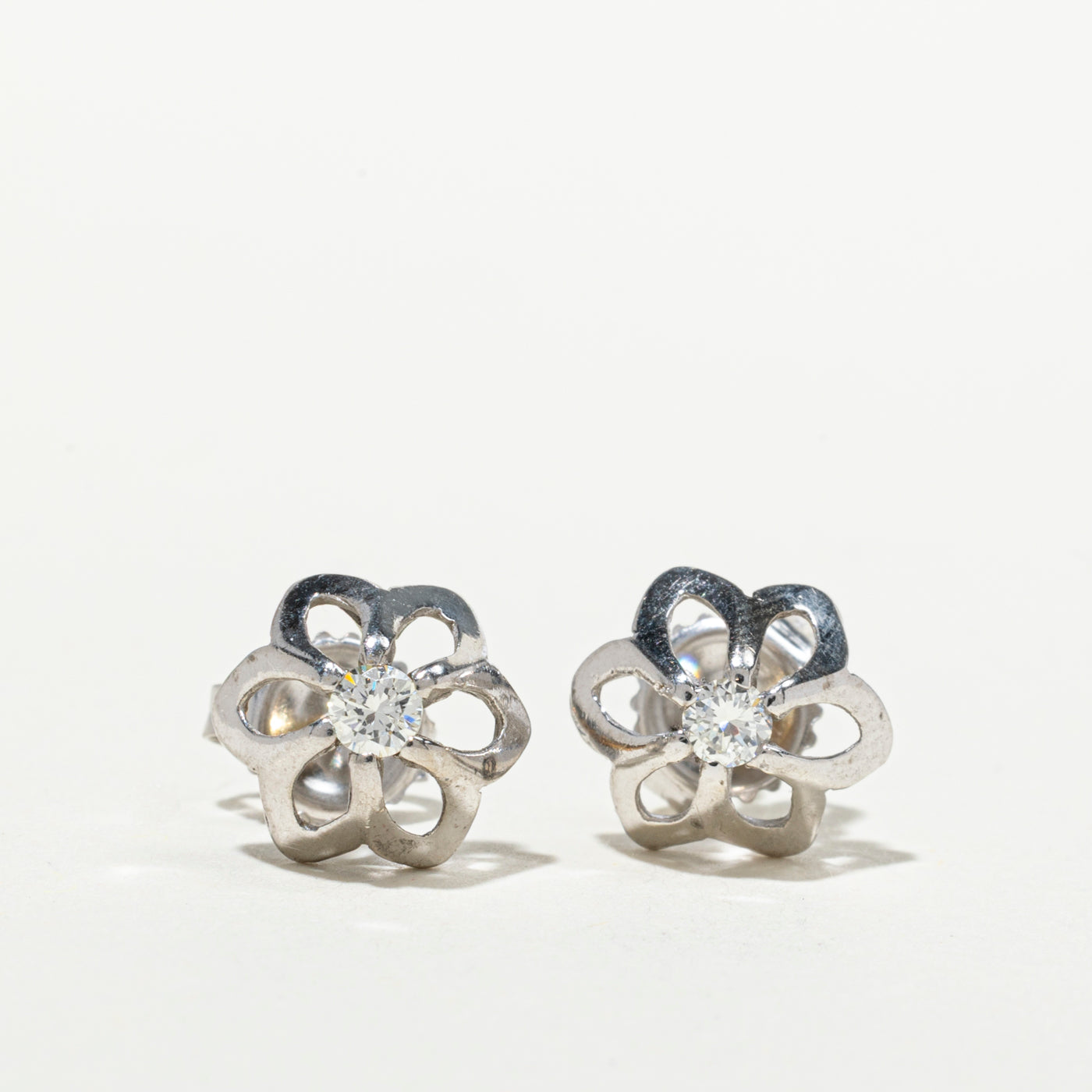 Belcher Set Diamond Floral Stud Earrings | 0.18ctw