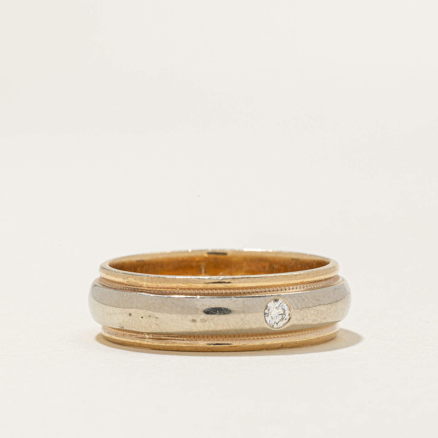 Bague bicolore en or sertie de diamants à fleur de grain | 0,05 ct | 6,90 mm | Taille 10,5 |