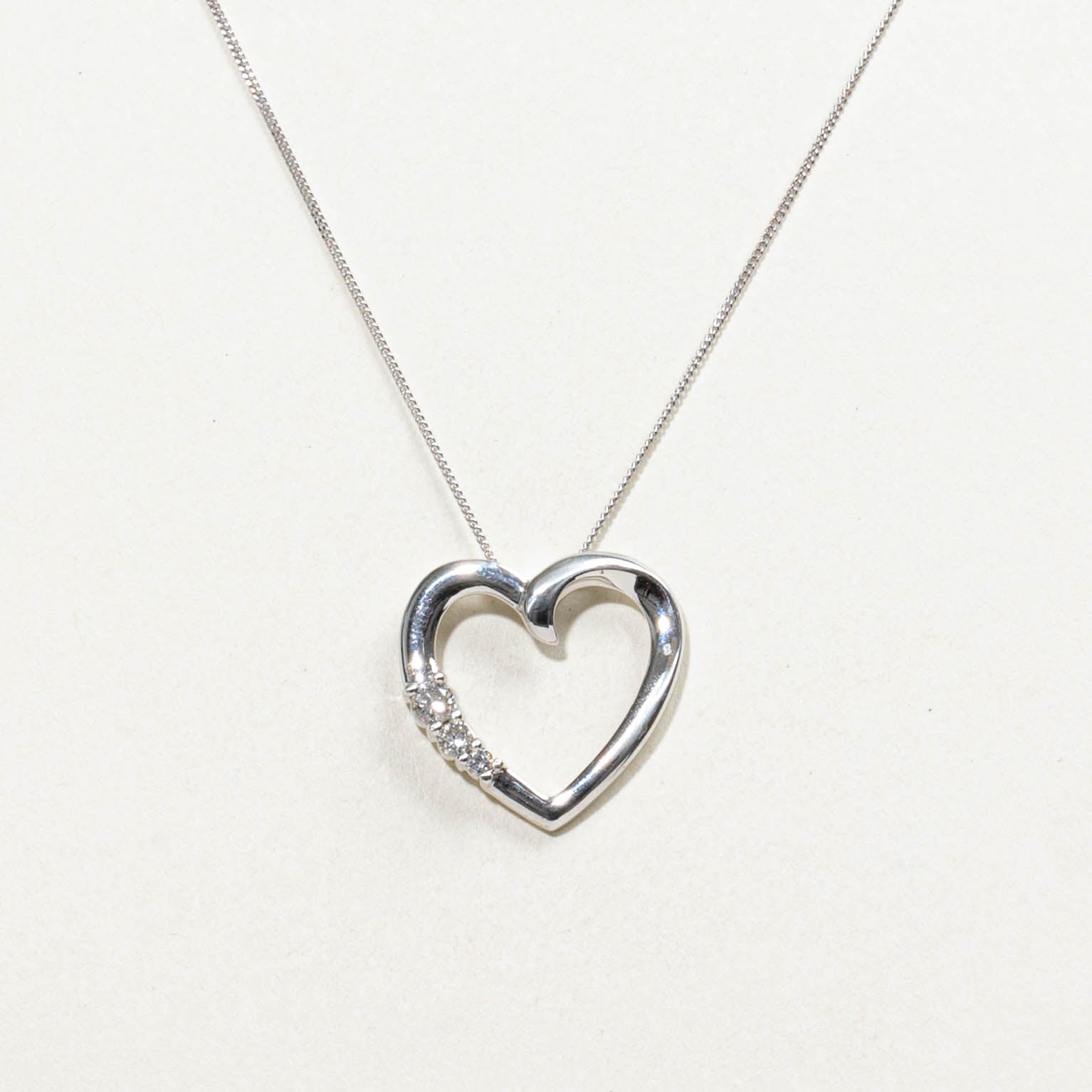 10k Diamond Open Heart Pendant Necklace | 0.13ctw | 18"