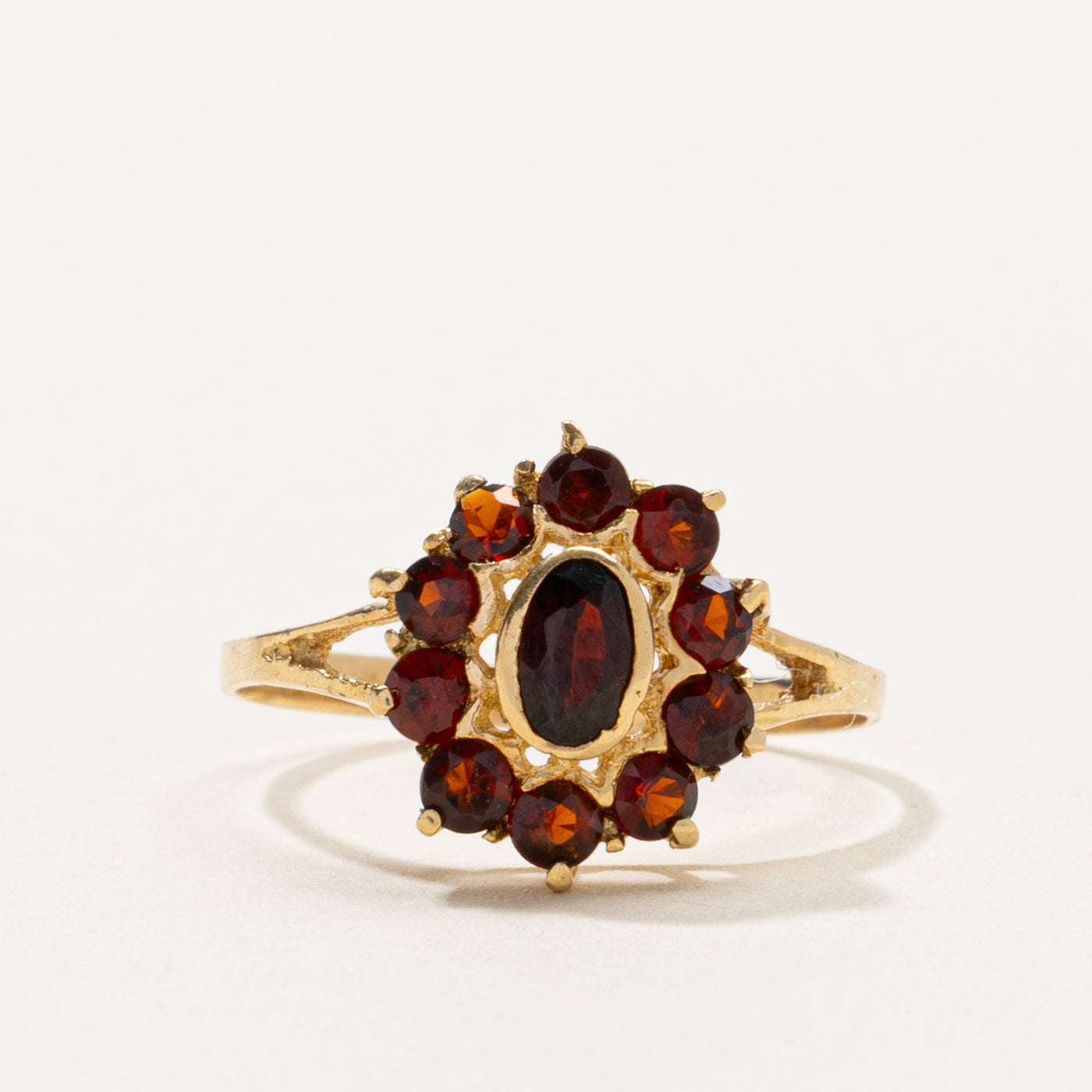 Oval Cut Garnet Petal Halo Ring | SZ 6.75