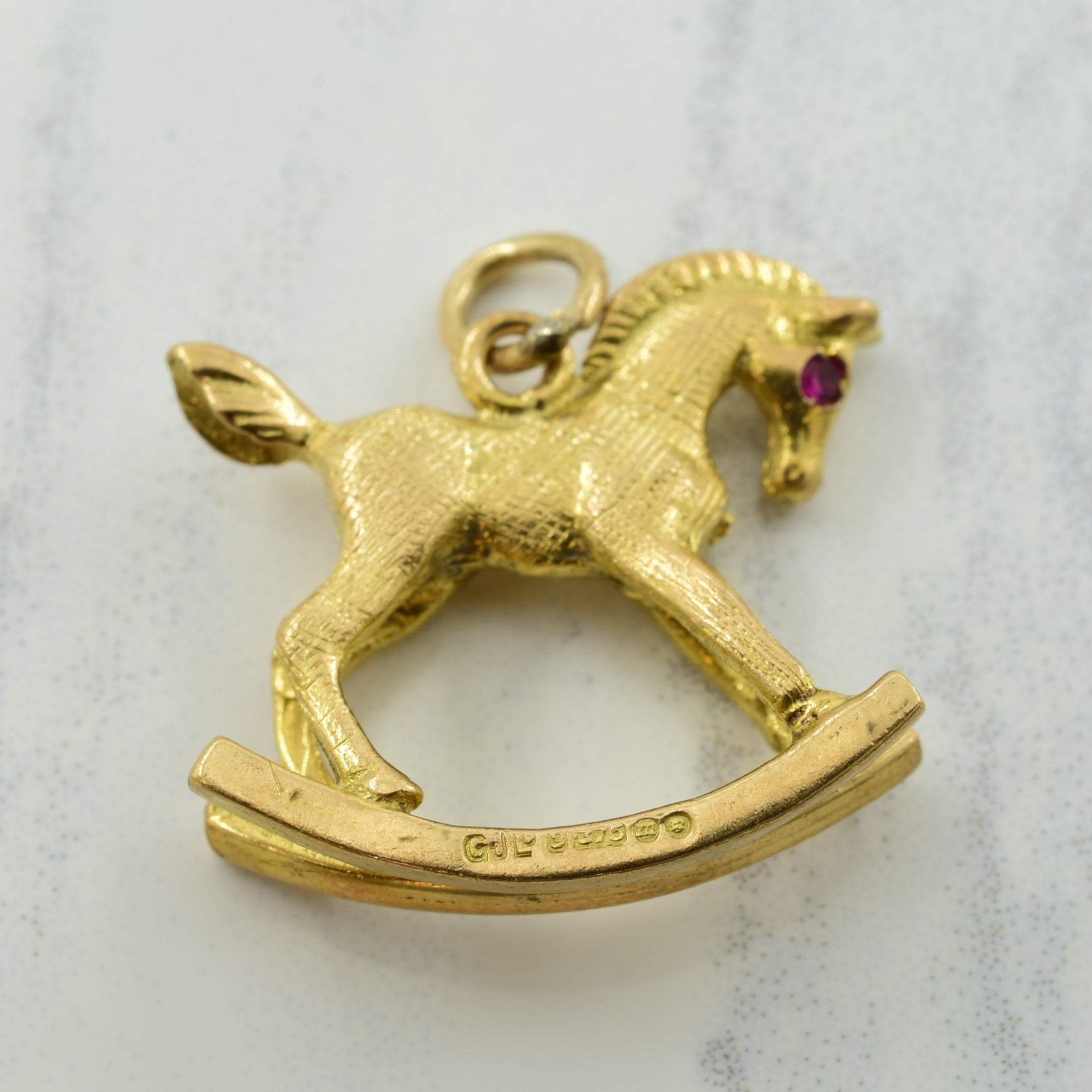 Synthetic Ruby Rocking Horse Charm |