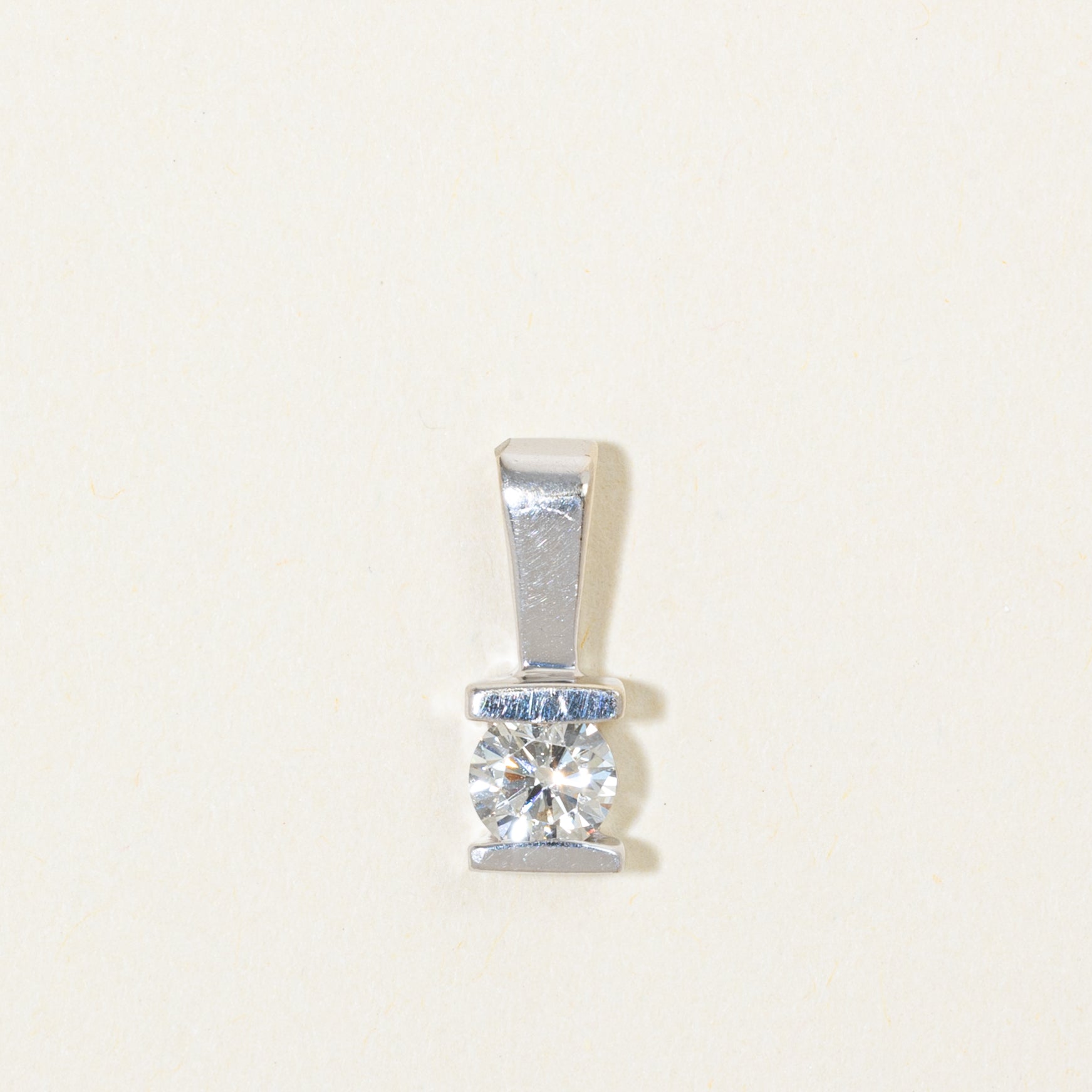 14k Round Brilliant Cut Tension Set Diamond Pendant | 0.56ct SI2 I