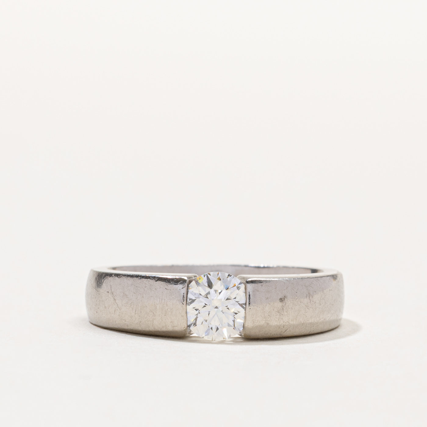 Palladium Round Brilliant Cut Tension Set Diamond Ring | 0.55ct SI1 G/H | SZ 6.5