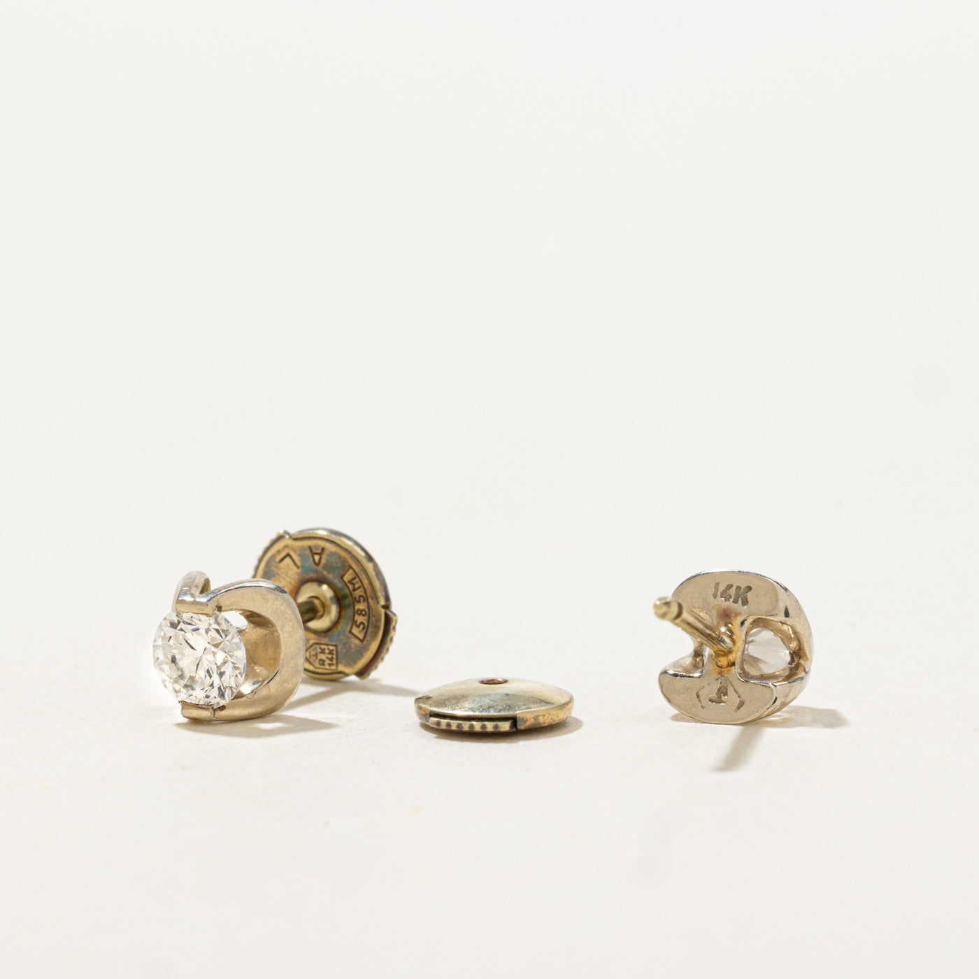 14k Tension Set Diamond Stud Earrings | 0.49ctw SI2/I1 G/H