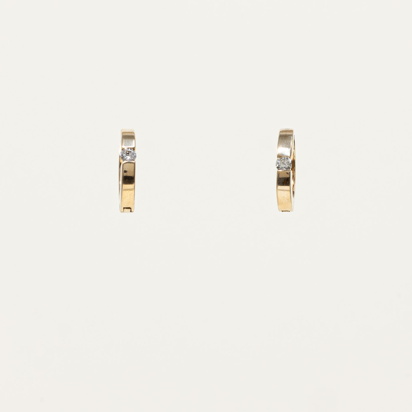 10k Single Diamond Huggie Earrings | 0.15ctw