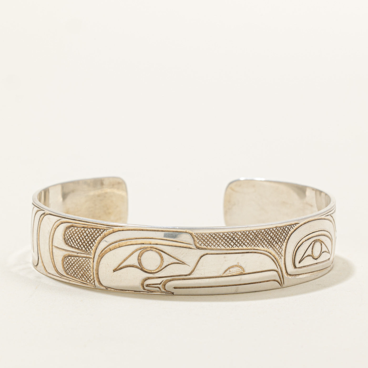 'Travis Henry' Sterling Silver Indigenous Carved Raven Cuff | 6"