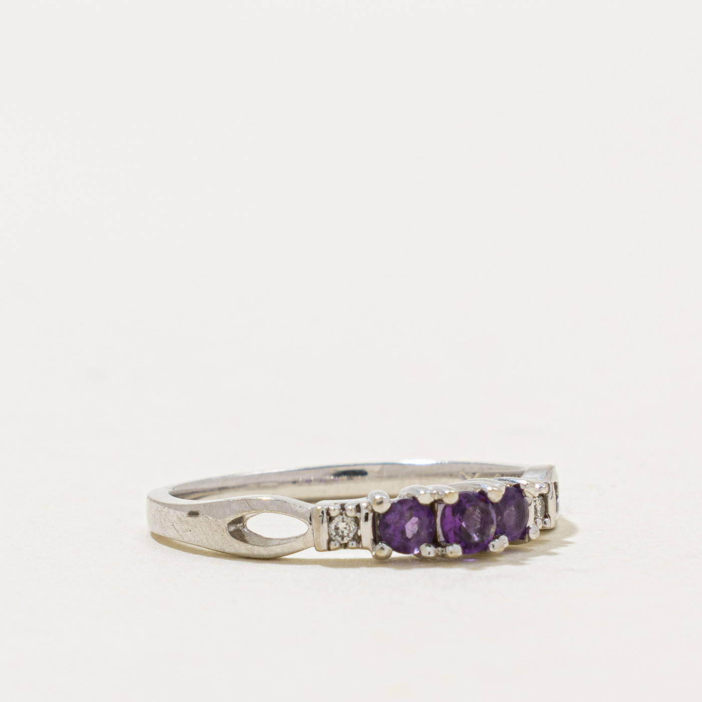 10k Three Stone Amethyst & Diamond Accented Ring | 0.20ctw, 0.02ctw | SZ 6.5