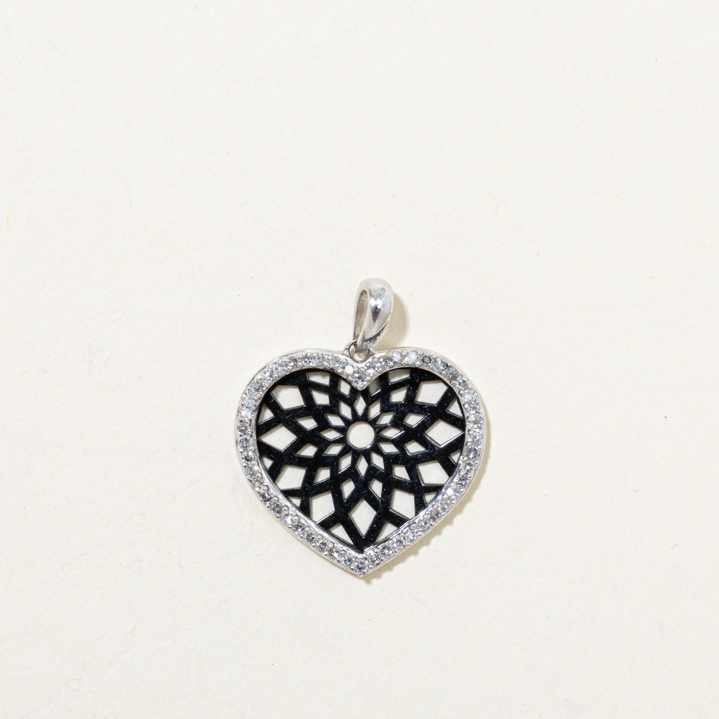 10k Diamond Openwork Heart Pendant | 0.19ctw