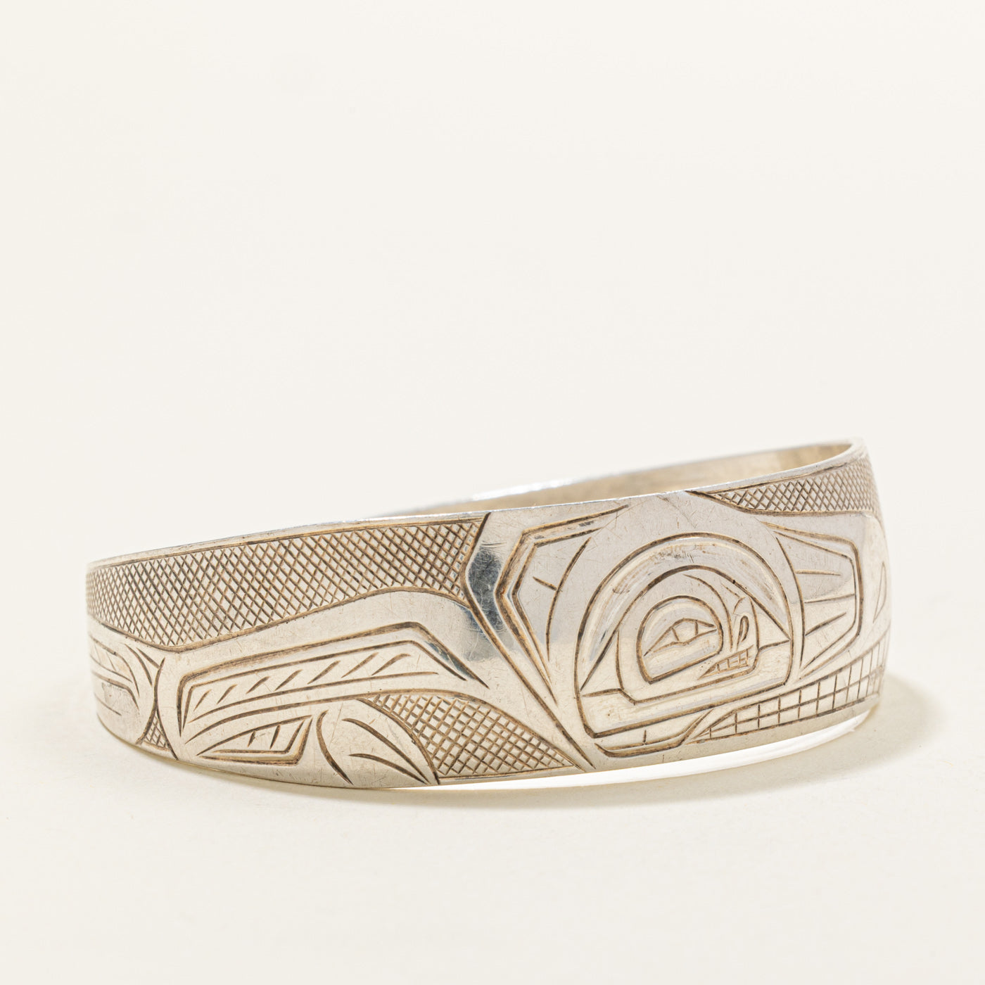 Sterling Silver Indigenous Carved Wolf Cuff | 6"
