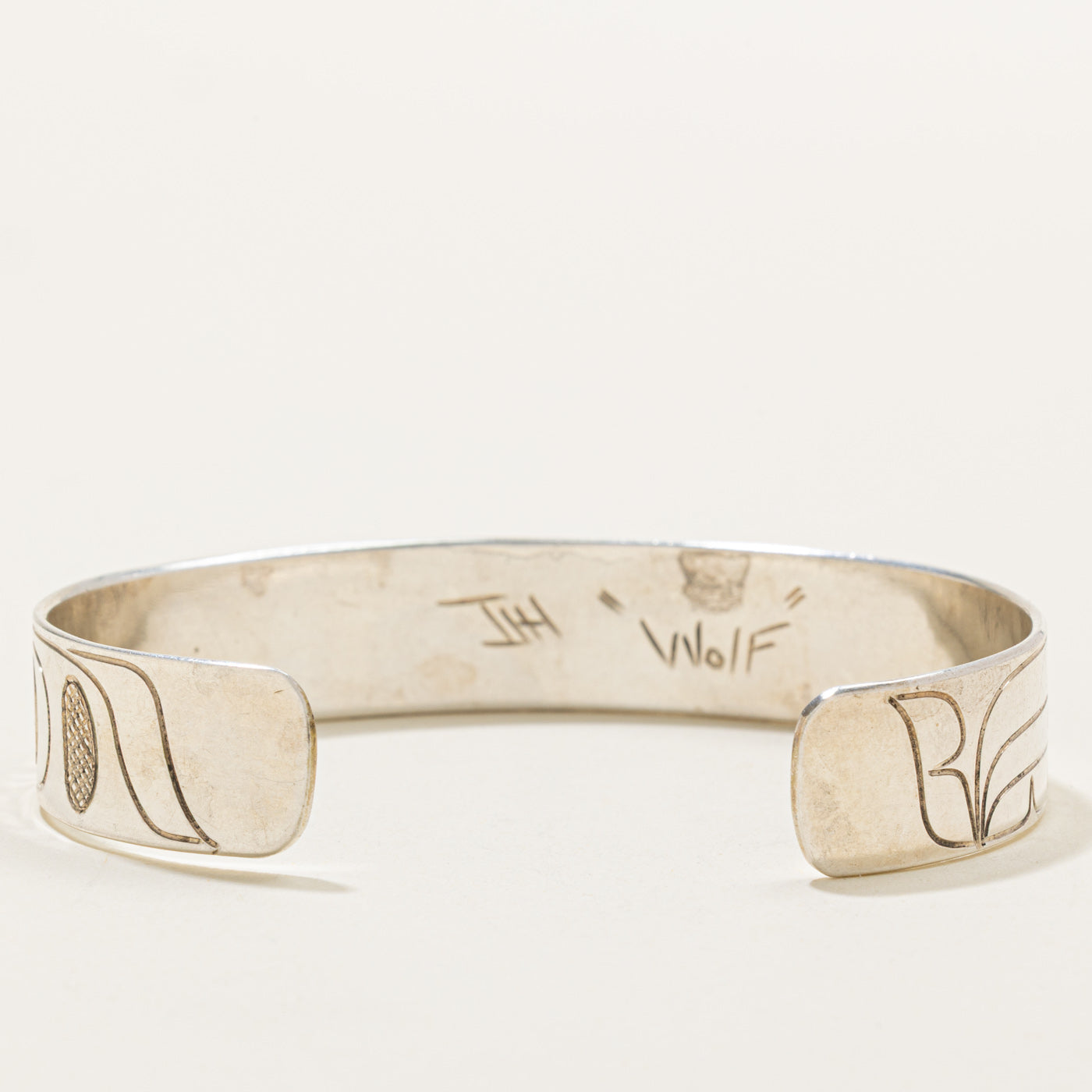 'Travis Henry' Sterling Silver Indigenous Carved Wolf Cuff | 6"