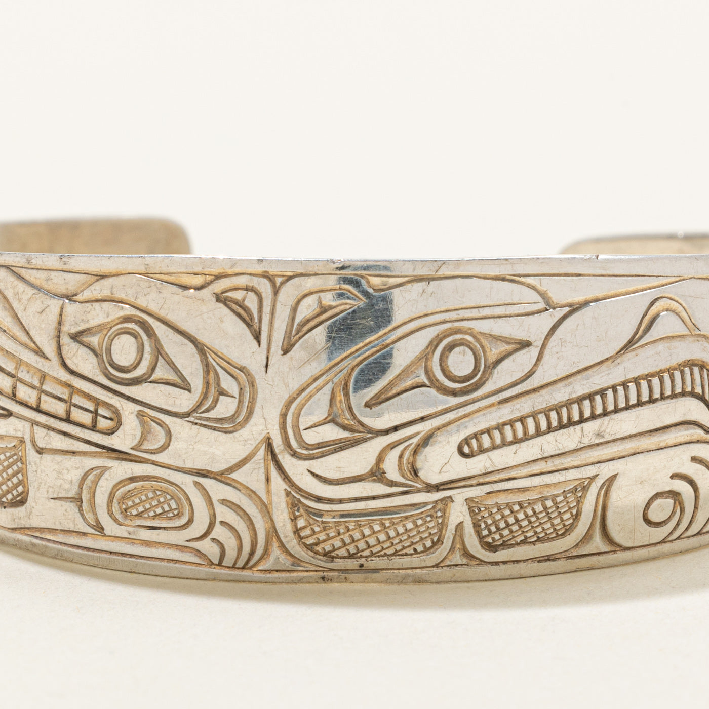 Sterling Silver Indigenous Carved Wolf & Thunderbird Cuff | 6"