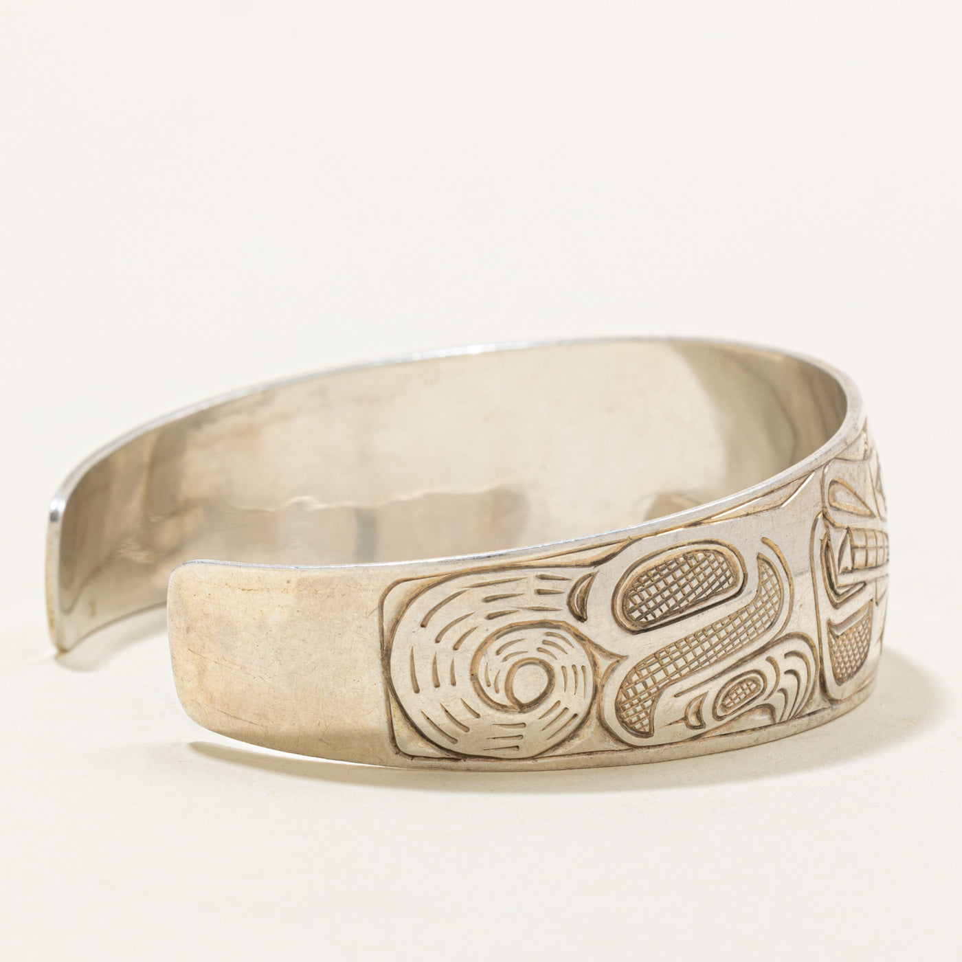 Sterling Silver Indigenous Carved Wolf & Thunderbird Cuff | 6"
