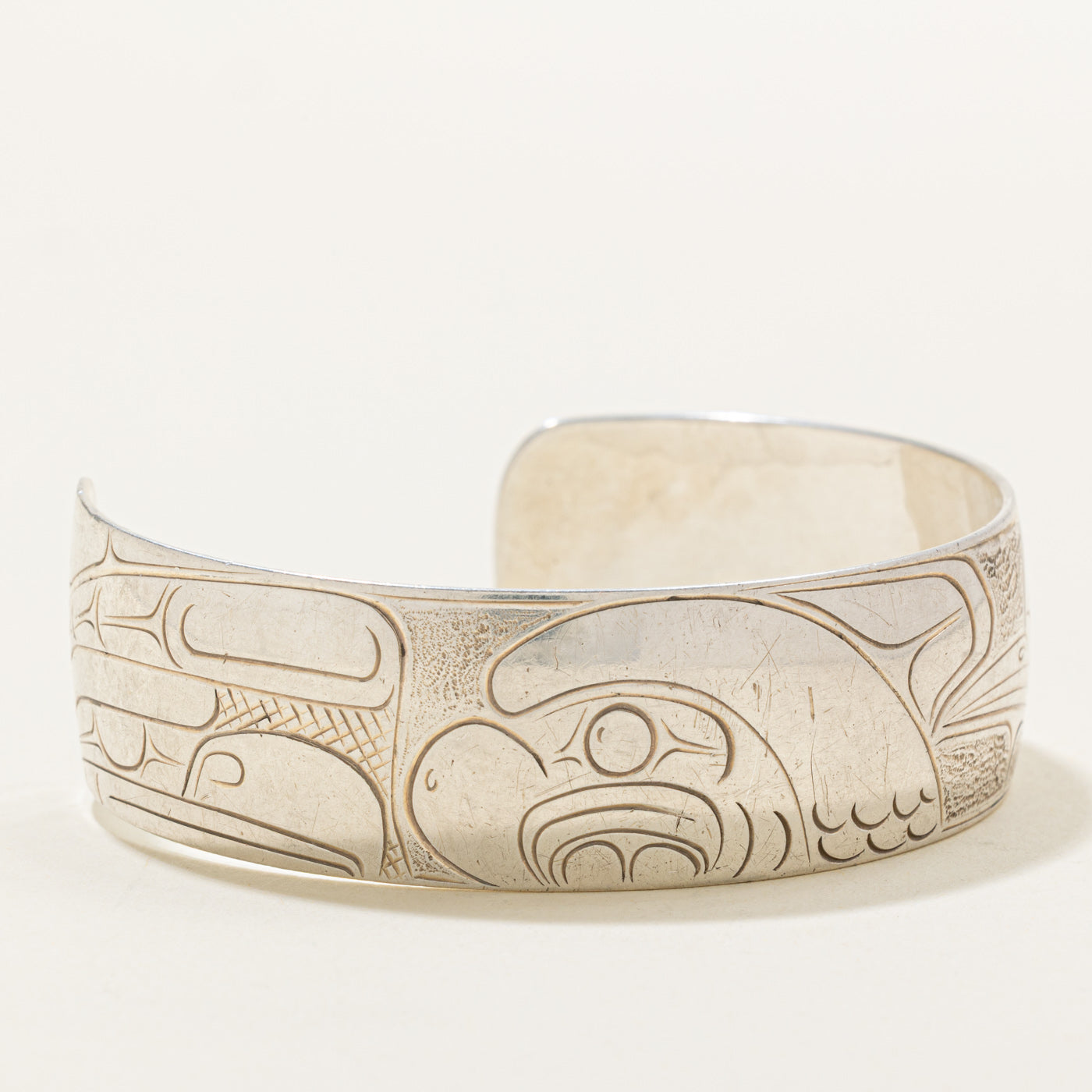 Sterling Silver Indigenous Carved Eagle & Hummingbird Cuff | 6"