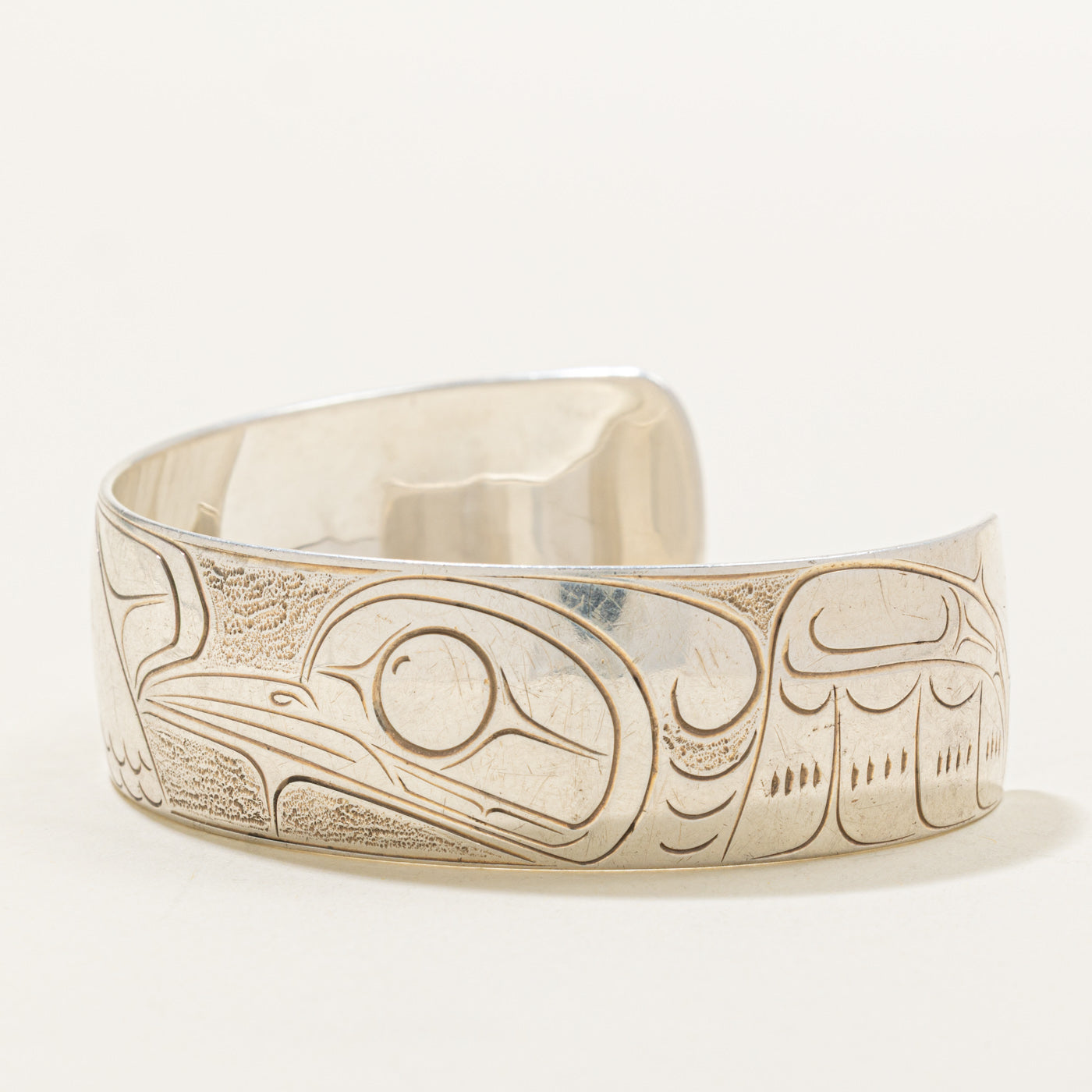 Sterling Silver Indigenous Carved Eagle & Hummingbird Cuff | 6"