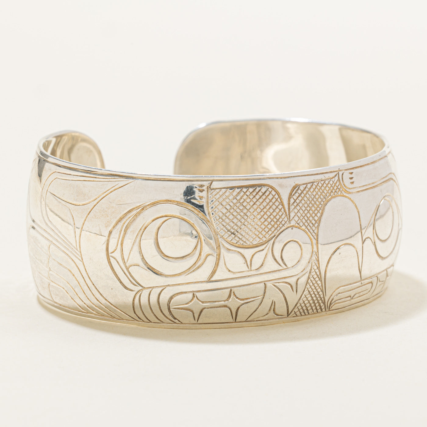 'Randy Wisla' Sterling Silver Indigenous Carved Eagle & Wolf & Moons Cuff | 7"