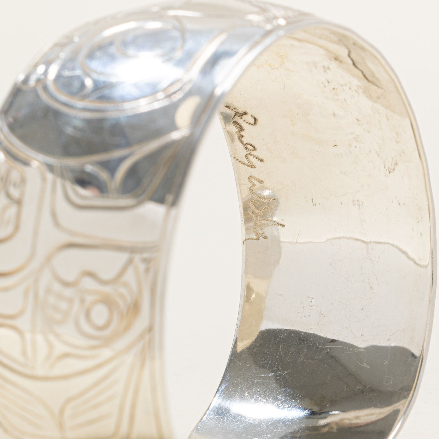 'Randy Wisla' Sterling Silver Indigenous Carved Eagle & Wolf & Moons Cuff | 7"