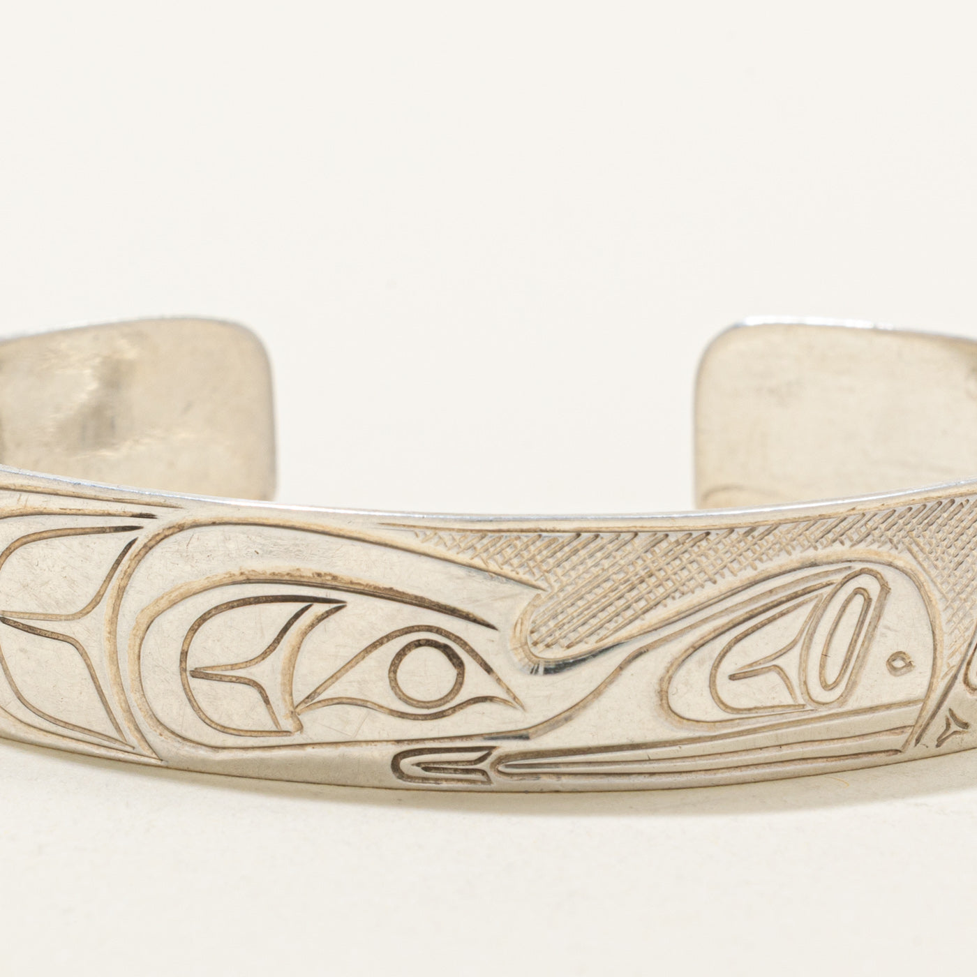 'Travis Henry' Sterling Silver Indigenous Carved Orca & Bird Cuff | 6"
