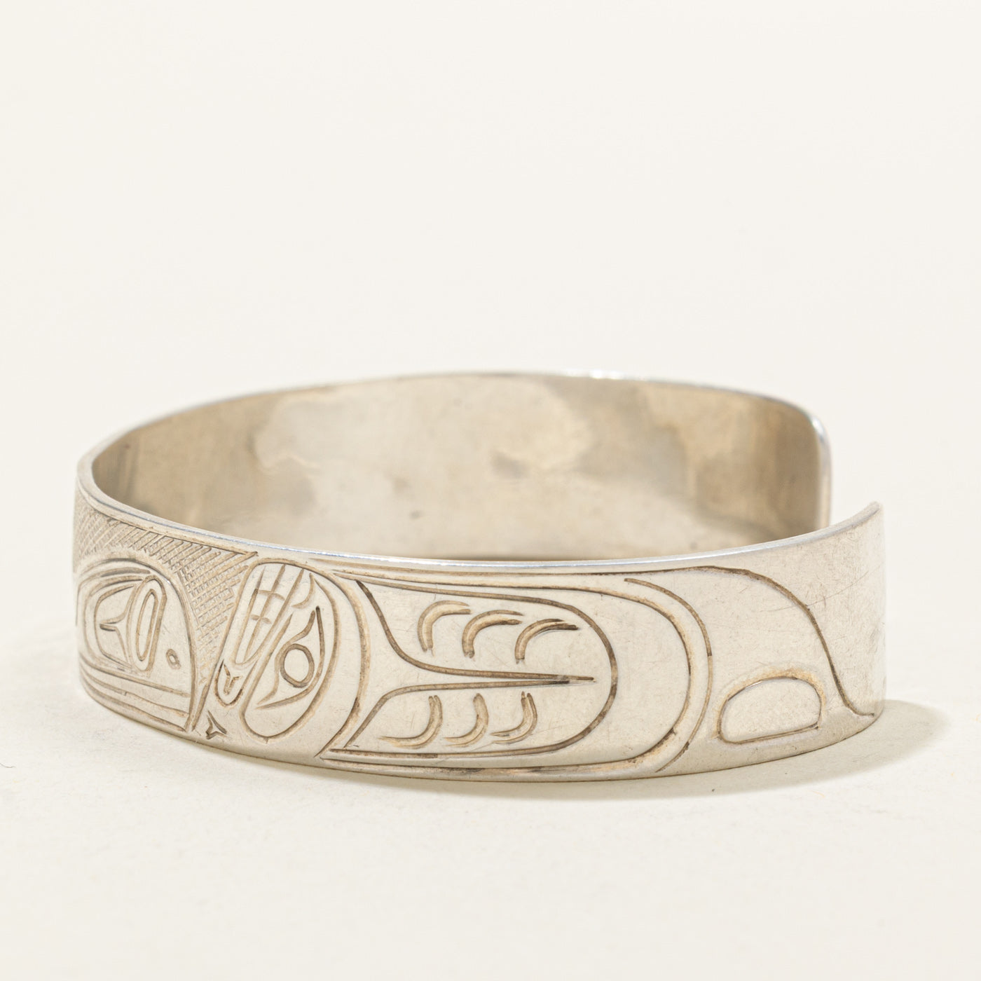'Travis Henry' Sterling Silver Indigenous Carved Orca & Bird Cuff | 6"