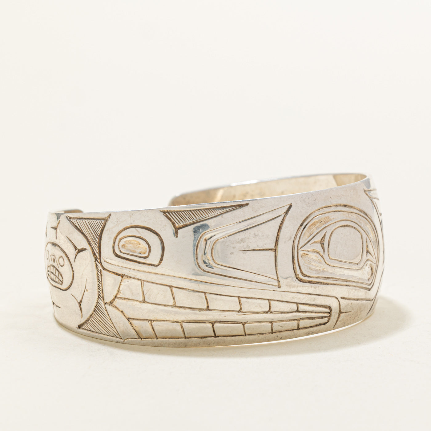 Sterling Silver Indigenous Carved Wolf Cuff | 6.5"