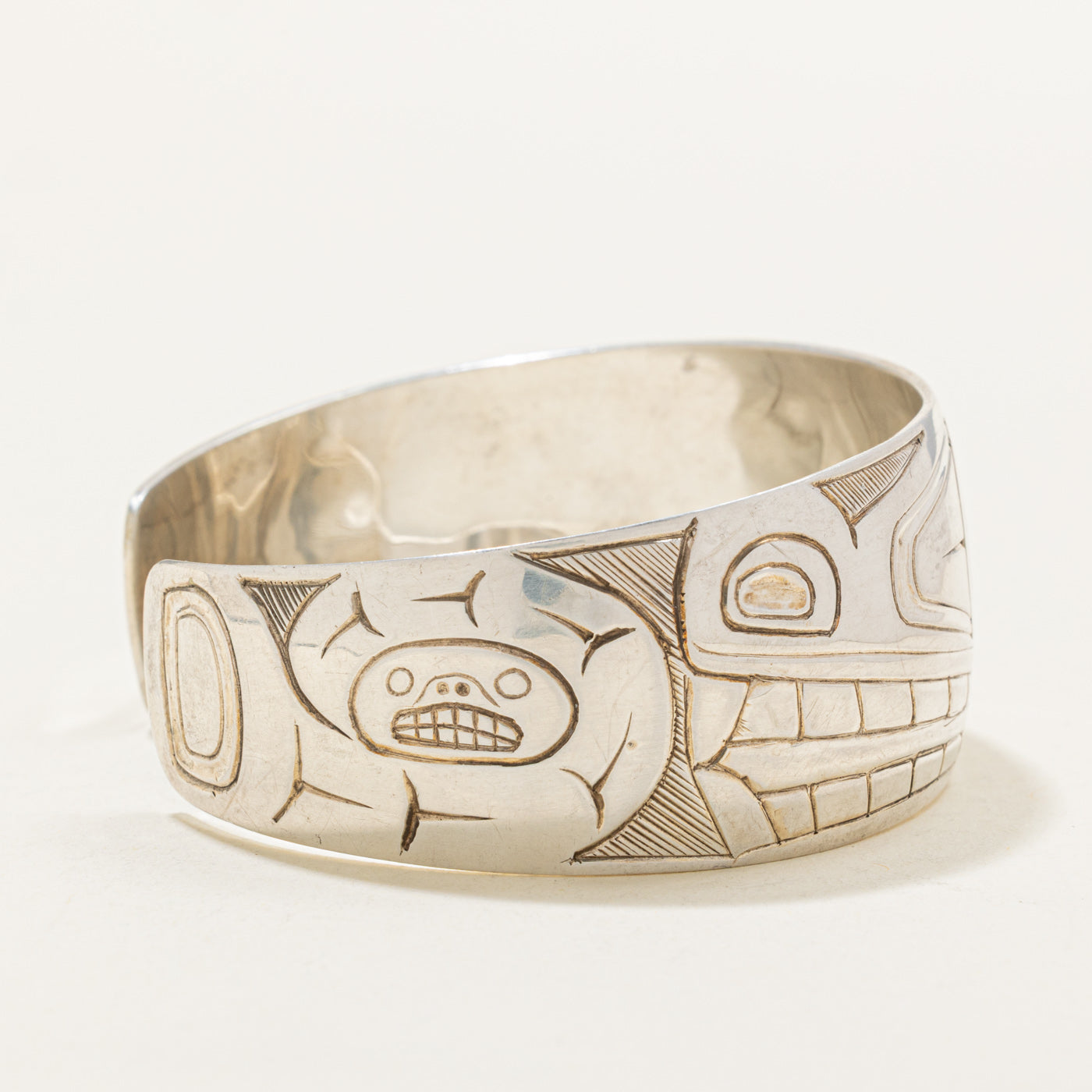 Sterling Silver Indigenous Carved Wolf Cuff | 6.5"