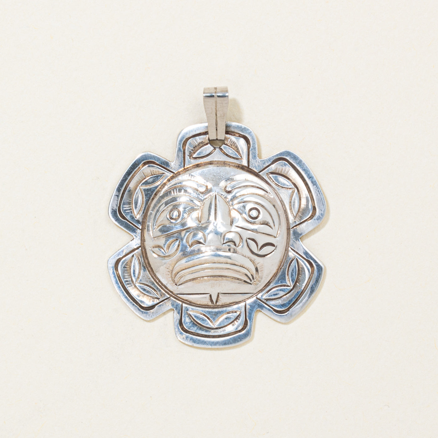 Sterling Silver Indigenous Carved Sun Pendant