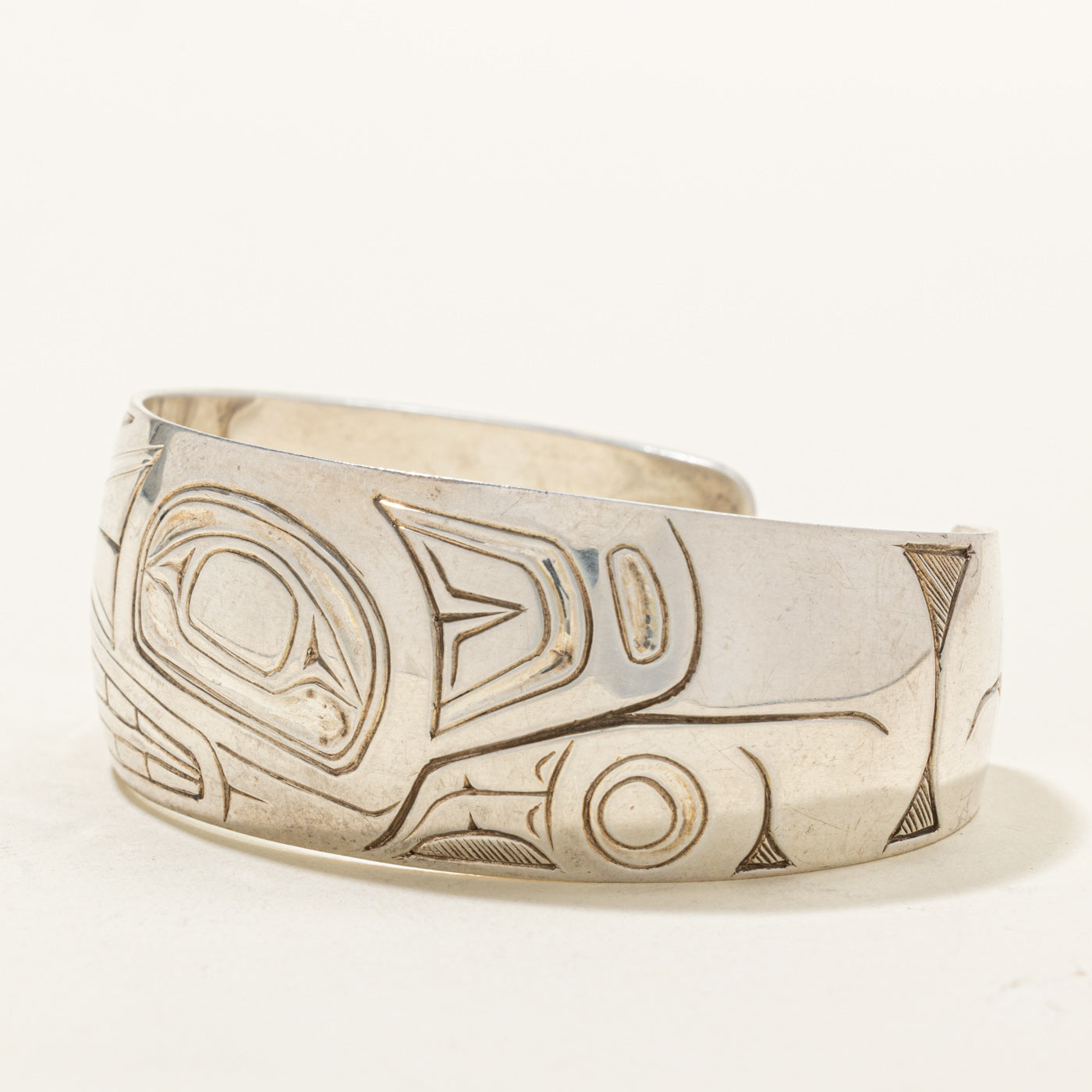Sterling Silver Indigenous Carved Wolf Cuff | 6.5"