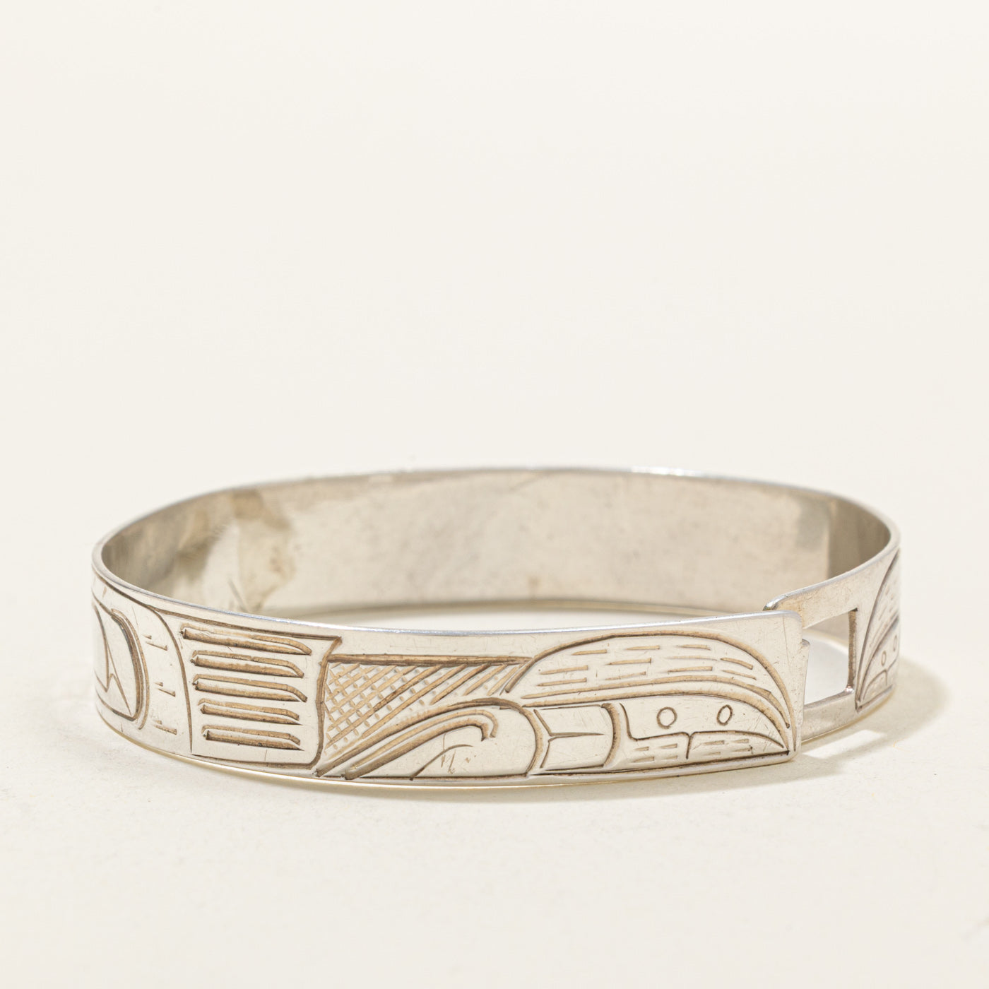 Sterling Silver & 14K Indigenous Carved Wolves & Moon Bangle | 7"