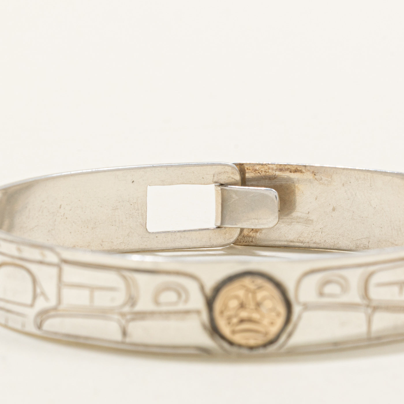 Sterling Silver & 14K Indigenous Carved Wolves & Moon Bangle | 7"