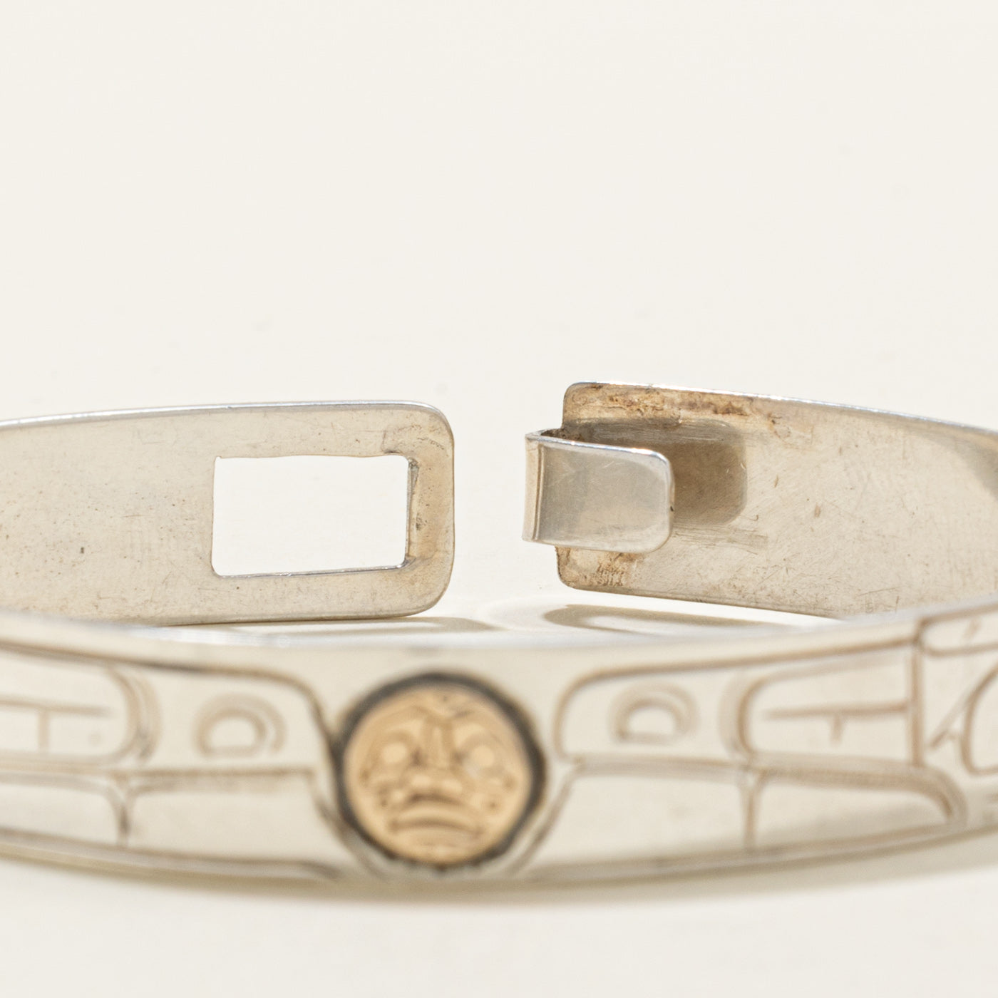 Sterling Silver & 14K Indigenous Carved Wolves & Moon Bangle | 7"