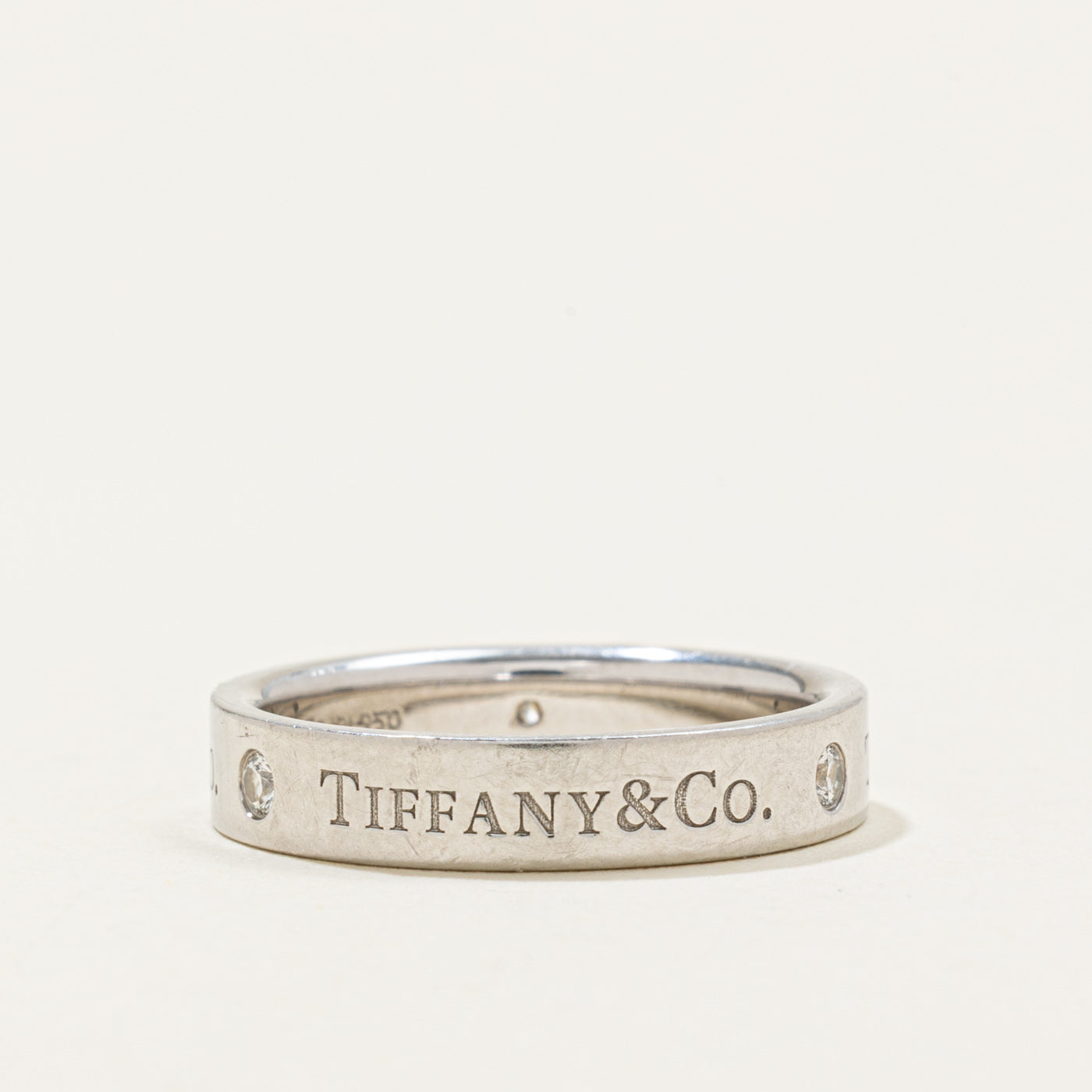 ‘Tiffany & Co’ T&Co. Band Ring | 0.07ctw | 4mm | SZ 7