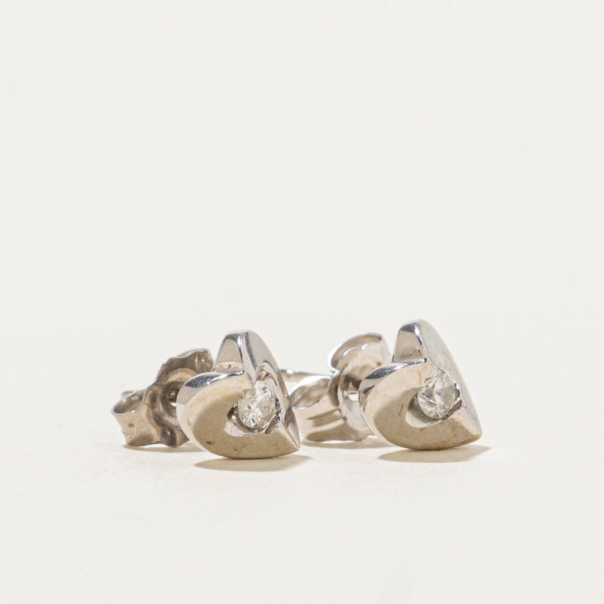 10k White Gold Diamond Heart Stud Earrings