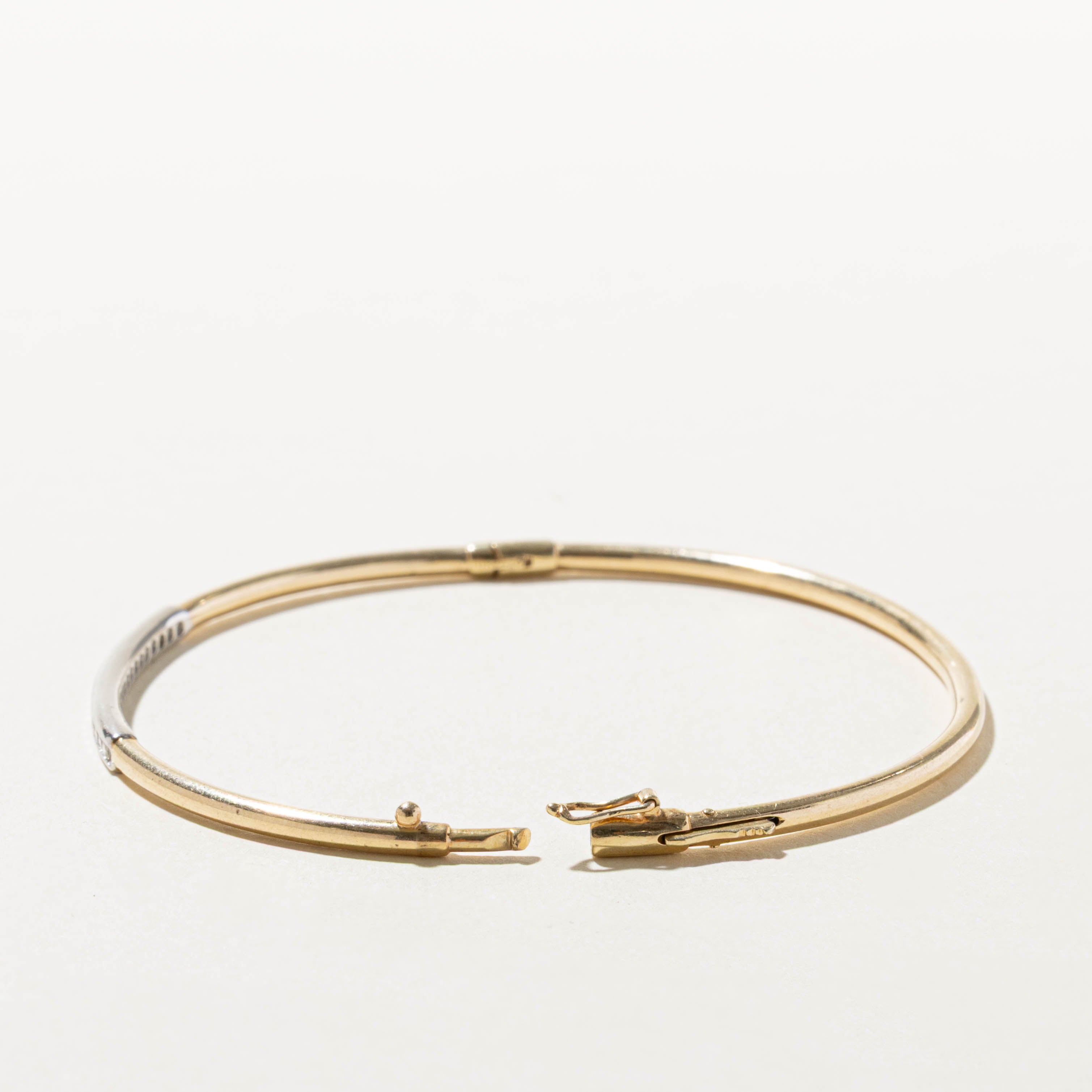 10k Two Tone Channel Set Diamond Bangle | 0.18ctw | 7.5"