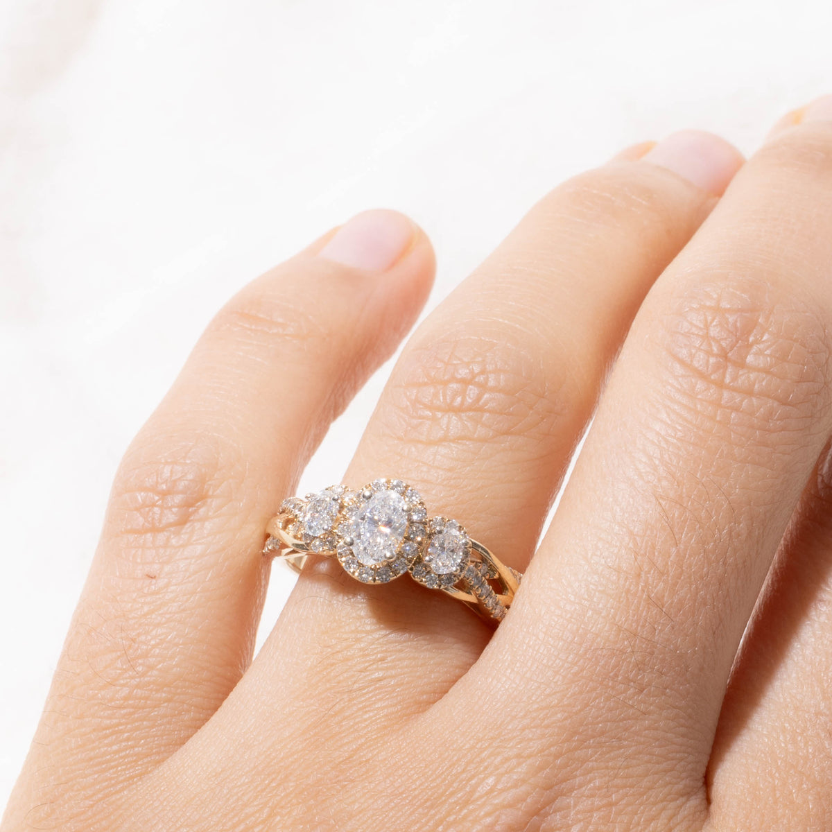 14k Three Stone Diamond Halo Cross Over Ring | 1.06ctw, 0.04ctw | SZ 9.25