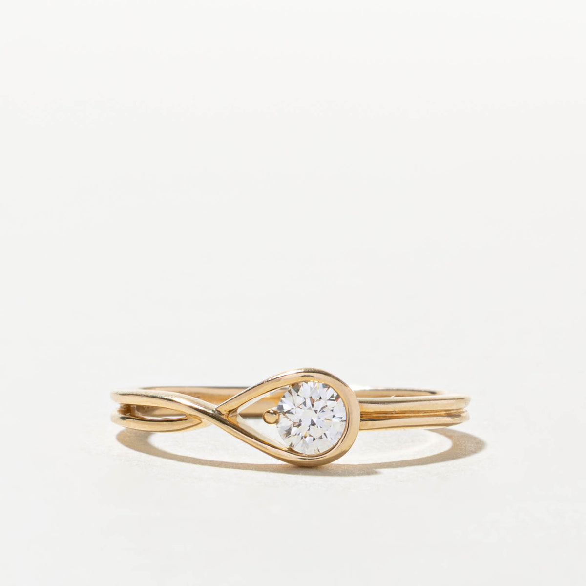 14k Solitaire Diamond Looped Cross Over Ring | 0.25ct VS1 H | SZ 7.75
