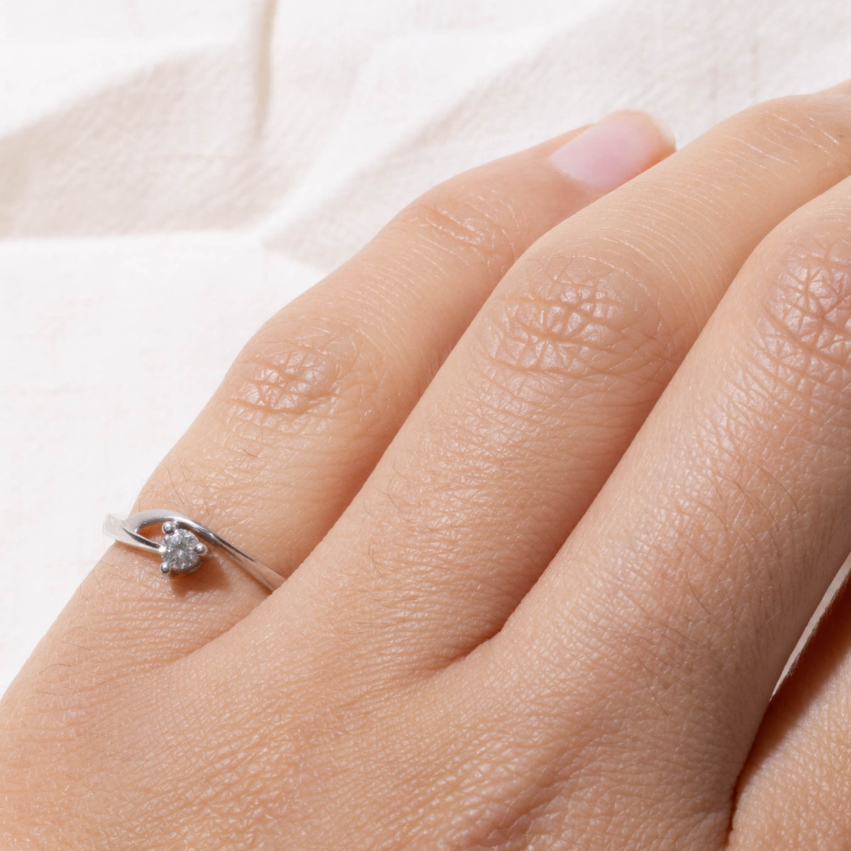 950 Platinum Solitaire Diamond Plain Bypass Ring | 0.08ct | SZ 4