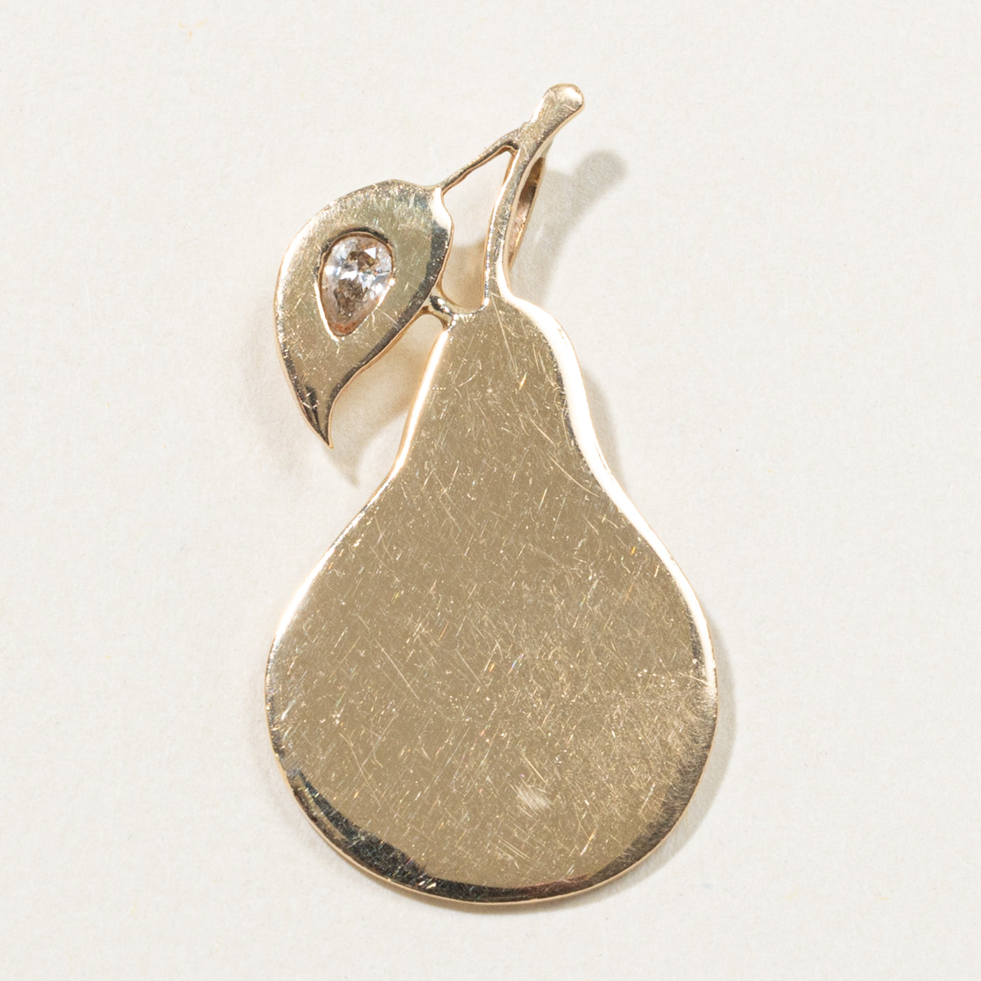 10k Flush Set Pear Cut Diamond Plain Pear Pendant | 0.12ct