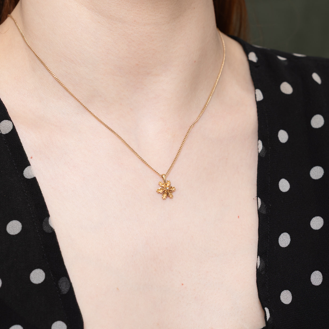 14k Single Diamond Snowflake Pendant