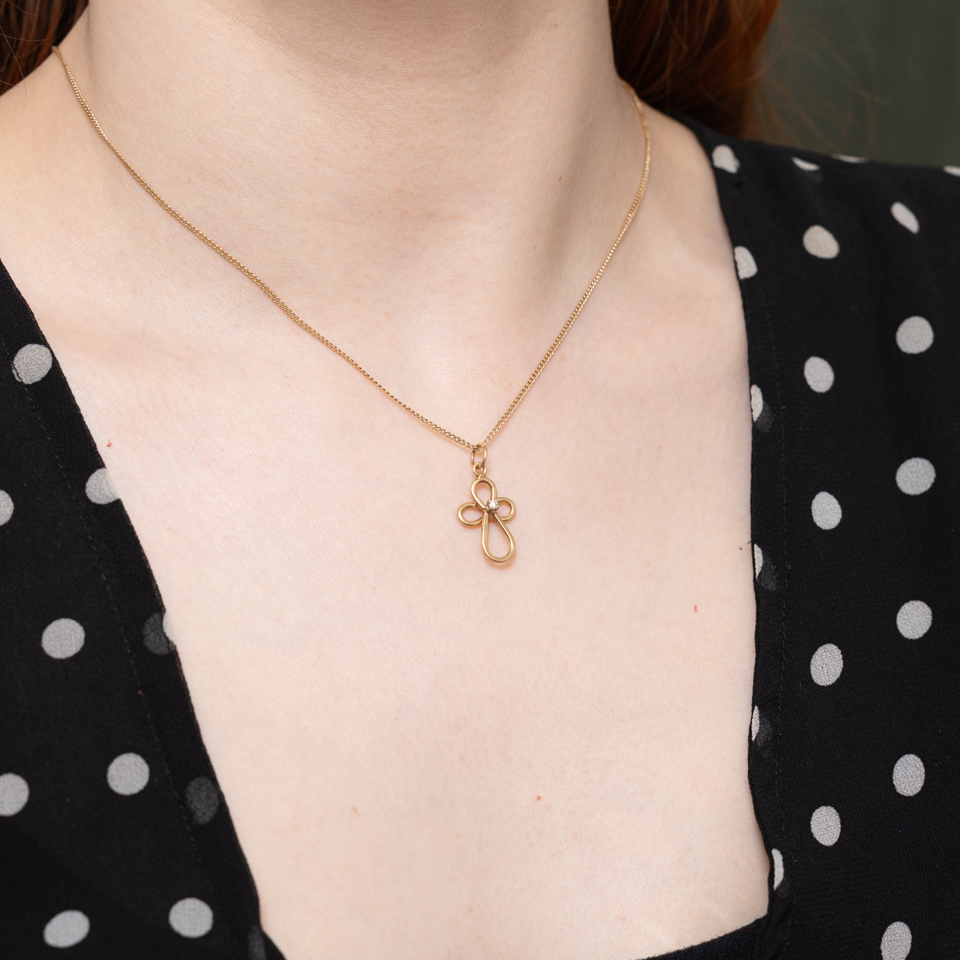 14k Diamond Looped Cross Pendant
