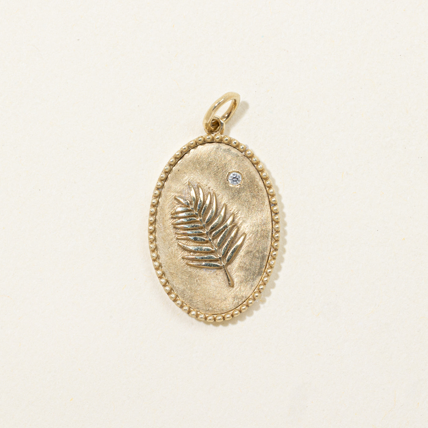 10k Diamond Leaf Embossed Pendant